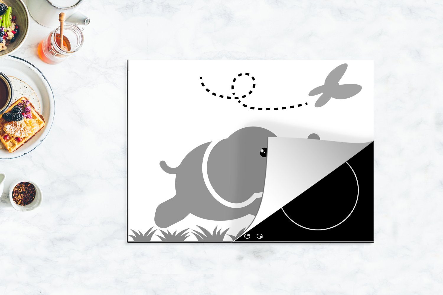 kleinen Elefanten Vinyl, einem Mobile Herdblende-/Abdeckplatte (1 Illustration nutzbar, Schmetterling cm, schwarz, 70x52 MuchoWow tlg), - Arbeitsfläche Ceranfeldabdeckung mit eines