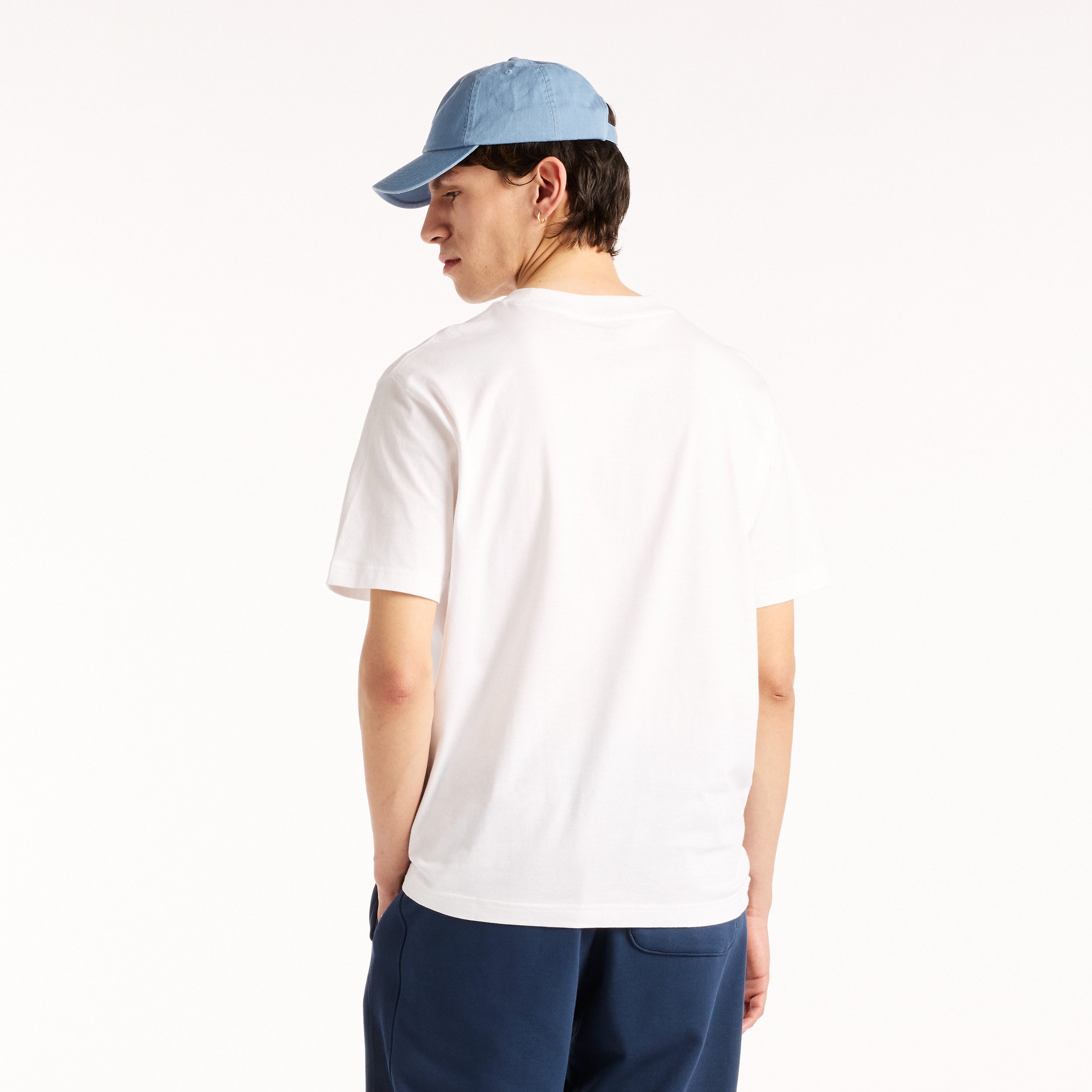 New Balance T-Shirt REIMAGINED GRAPHIC T-SHIRT sportlicher Stil, T-Shirt-Schnitt, für Sportmode, aus Baumwolle