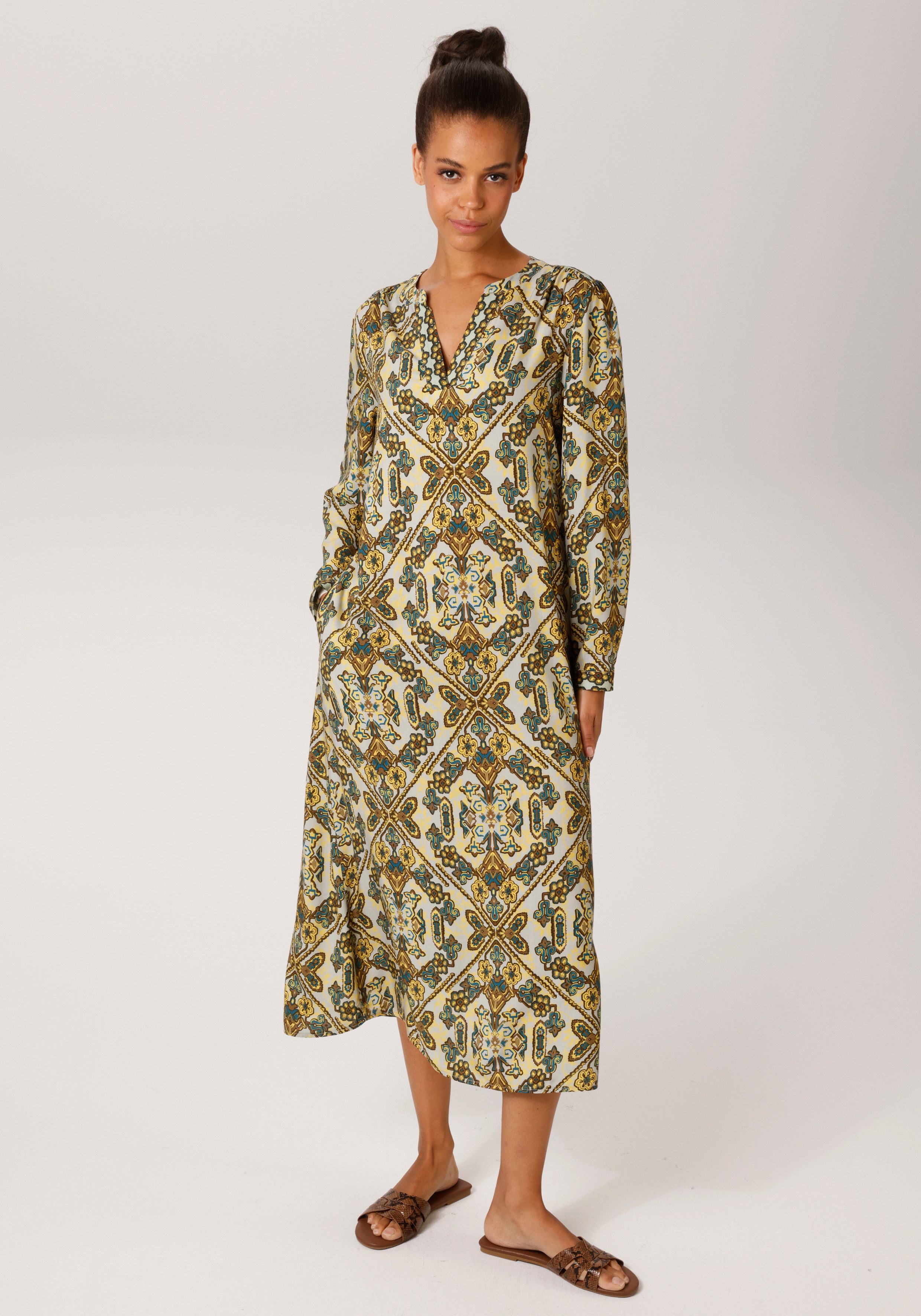 Aniston CASUAL Blusenkleid mit extravagantem, grafischen Druck - NEUE KOLLEKTION. € 59,99, (€ 59,99 pro 1 Stk).