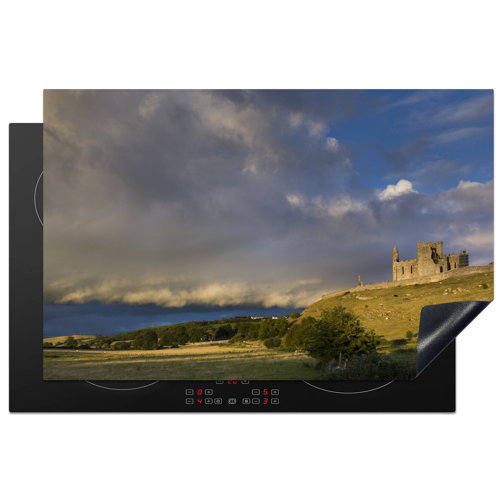 MuchoWow Herdblende-/Abdeckplatte Rock of Cashel in Irland am Abend mit großen Wolken, Vinyl, (1 tlg), 81x52 cm, Induktionskochfeld Schutz für die küche, Ceranfeldabdeckung