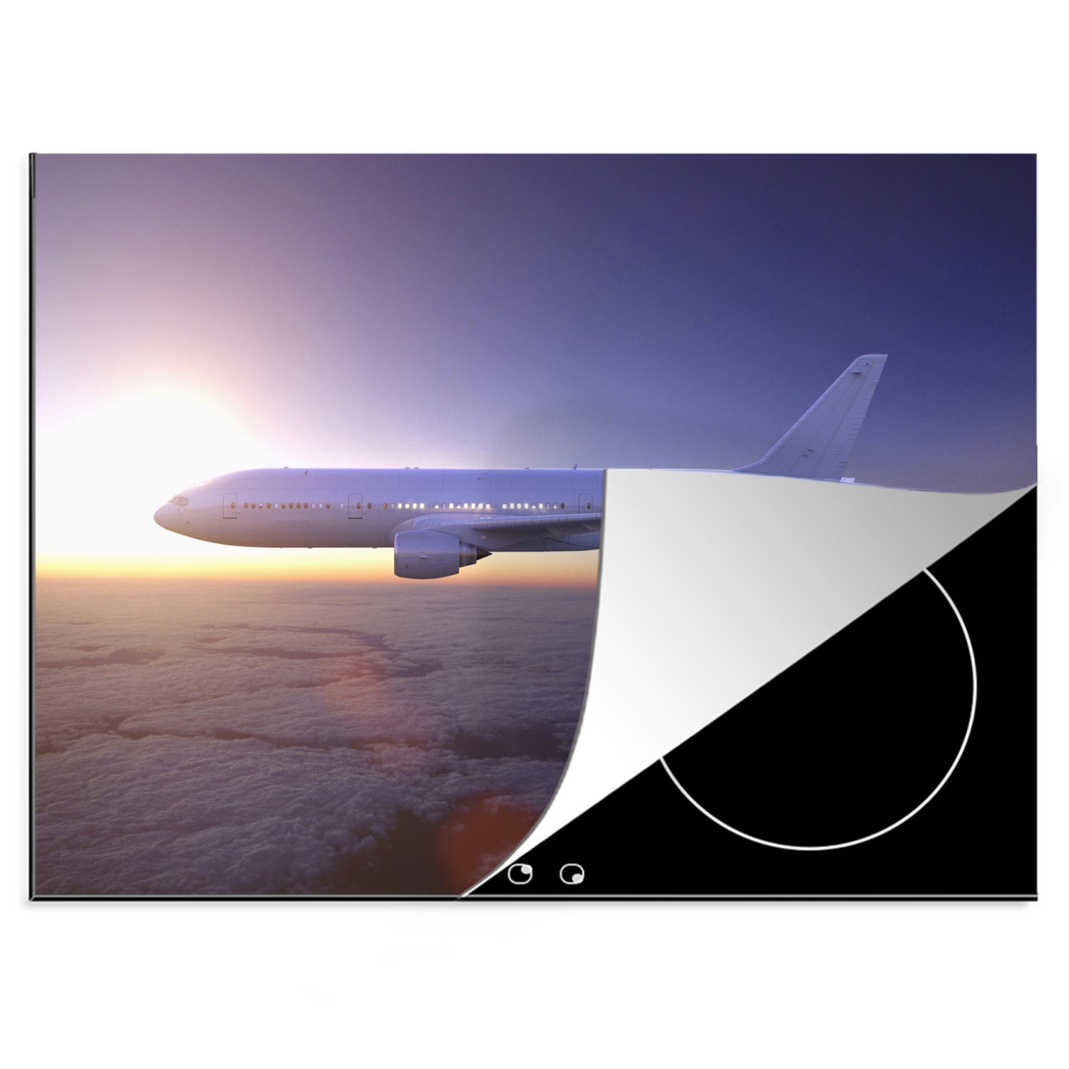 MuchoWow Herdblende-/Abdeckplatte Ein Flugzeug über einem schönen Wolkenvorhang, Vinyl, (1 tlg), 70x52 cm, Mobile Arbeitsfläche nutzbar, Ceranfeldabdeckung