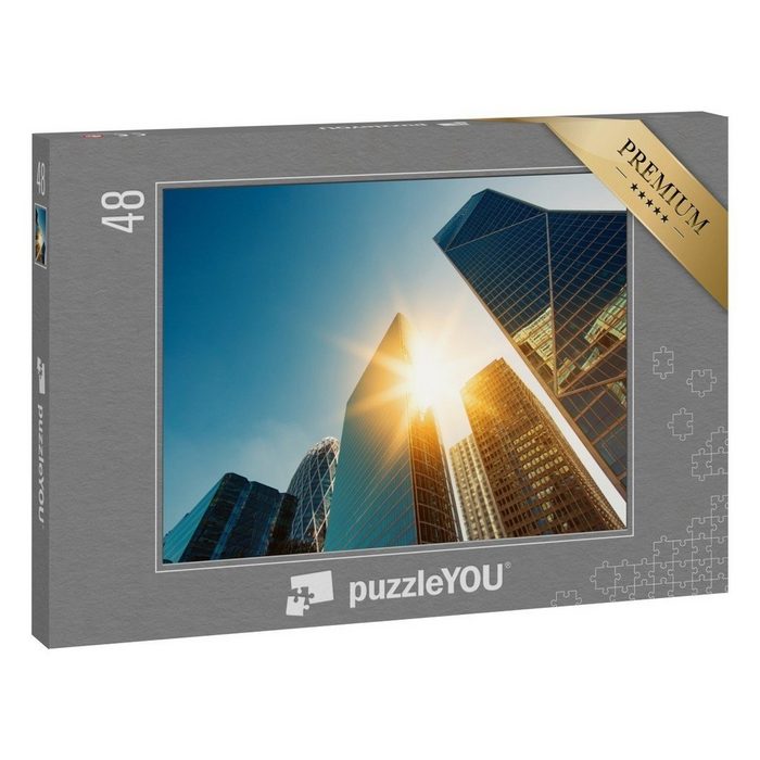 puzzleYOU Puzzle Wolkenkratzer im Sonnenaufgang La Defense Paris 48 Puzzleteile puzzleYOU-Kollektionen Sonne