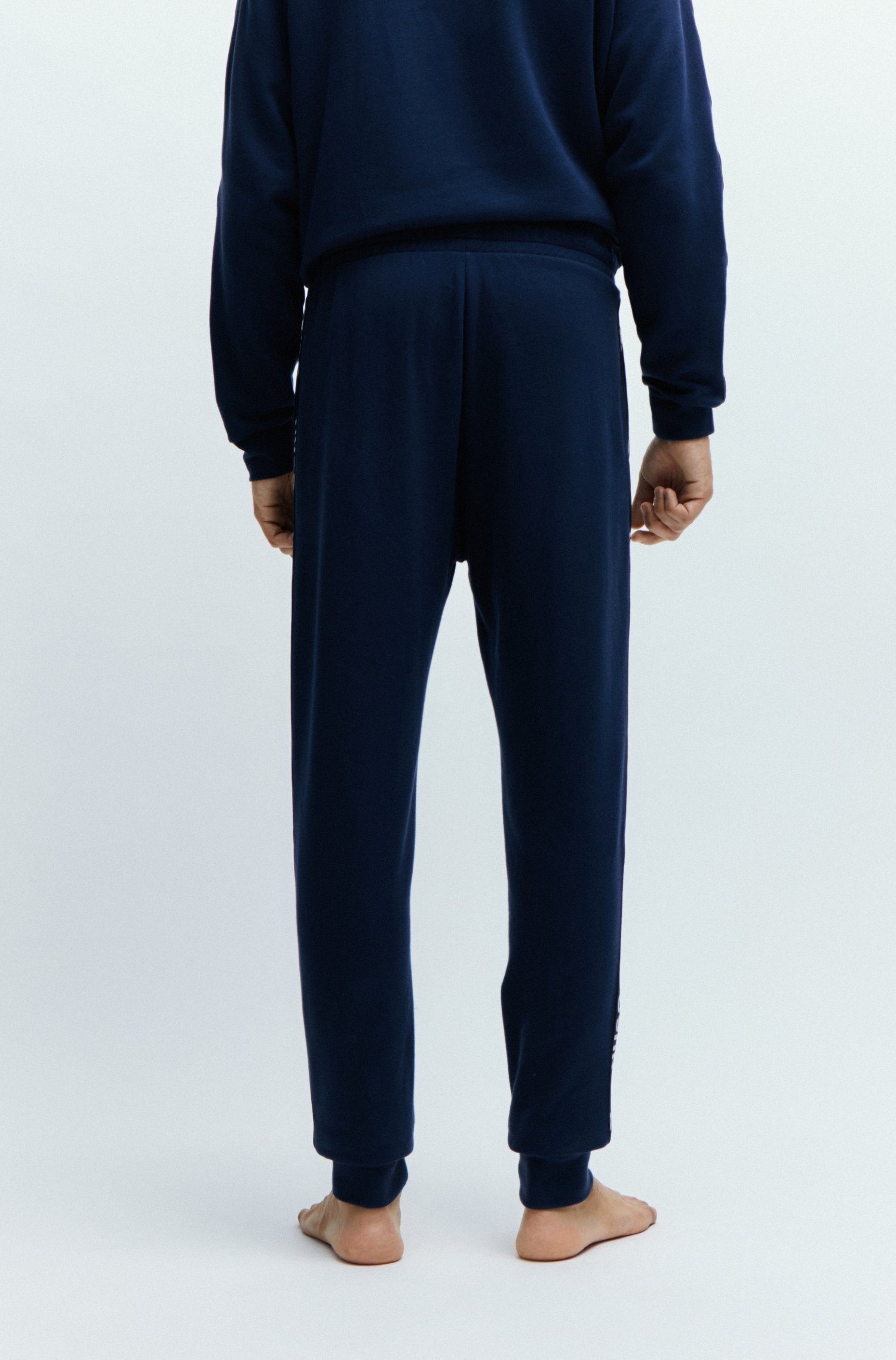 HUGO Sweathose Sporty durchgehenden HUGO Blue405 Dark Pant mit Schriftzug Logo