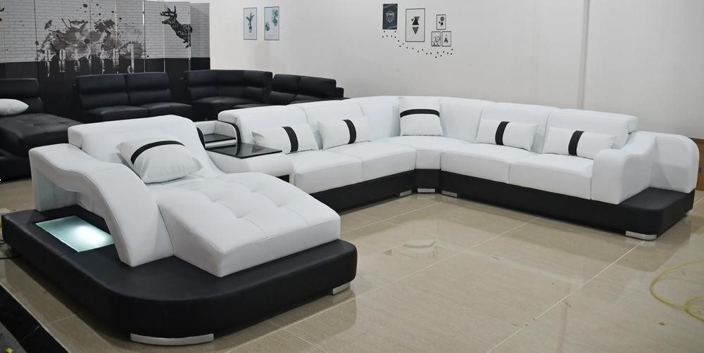 Xlmoebel Wohnlandschaft Elegantes Ecksofa aus Leder und Textil für stilvolles Wohnen, Hergestellt in Europa