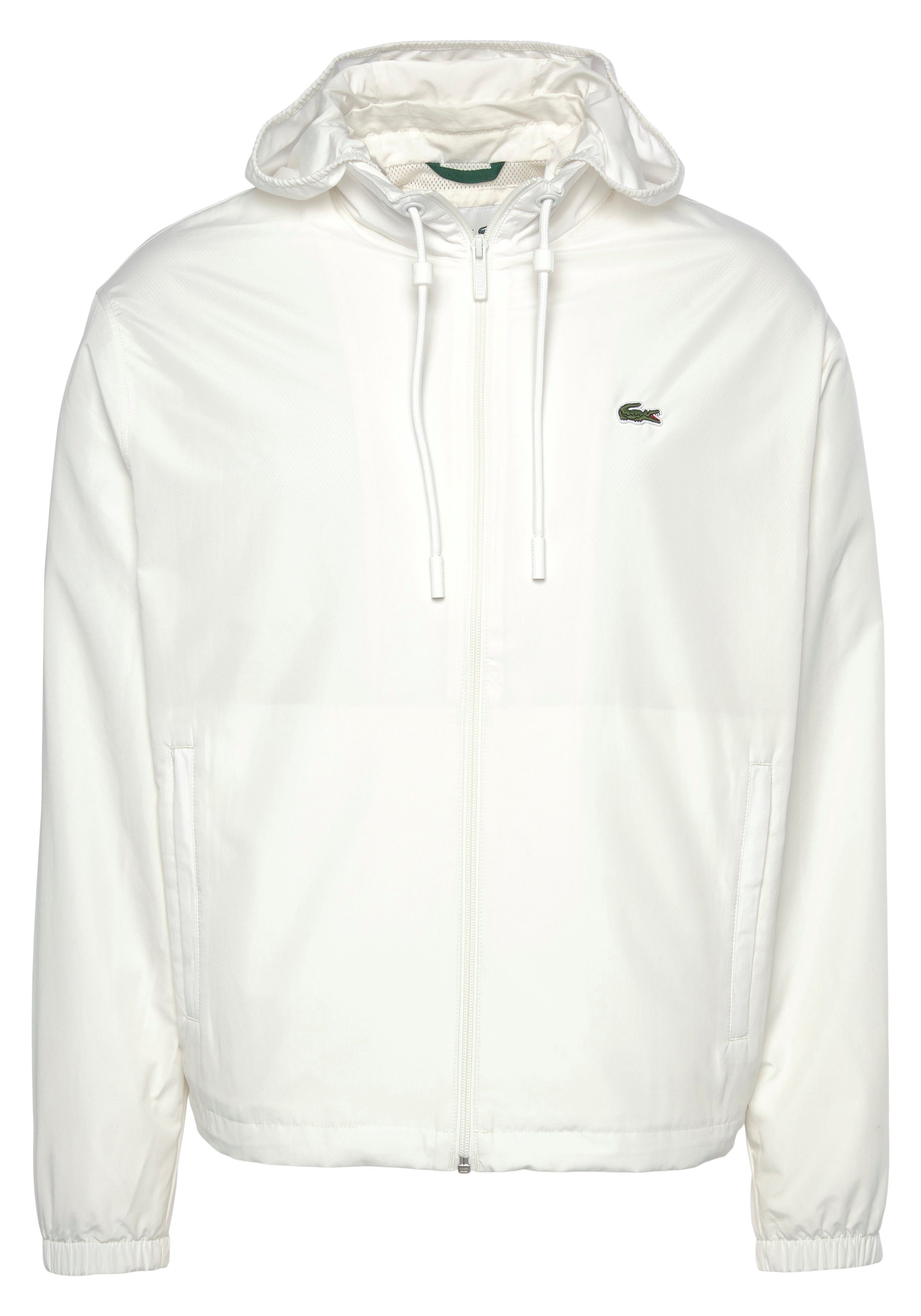 Lacoste Trainingsjacke TRAININGSJACKE Perfekt weiß mit Jacke für Tennis Kapuze, wasserabweisende abnehmbarer