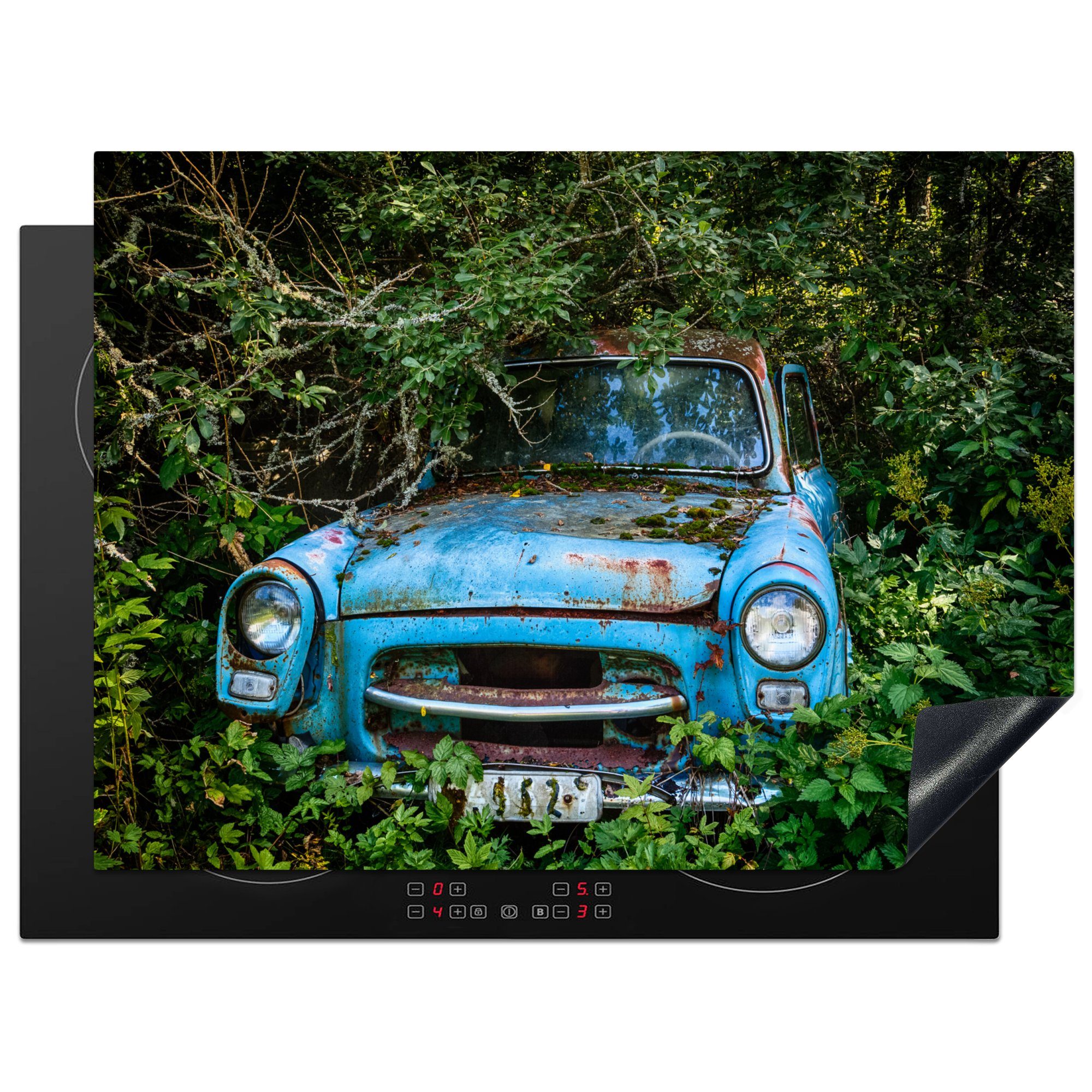 MuchoWow Herdblende-/Abdeckplatte Verlassenes blaues Auto in einem Wald, Vinyl, (1 tlg), 70x52 cm, Mobile Arbeitsfläche nutzbar, Ceranfeldabdeckung