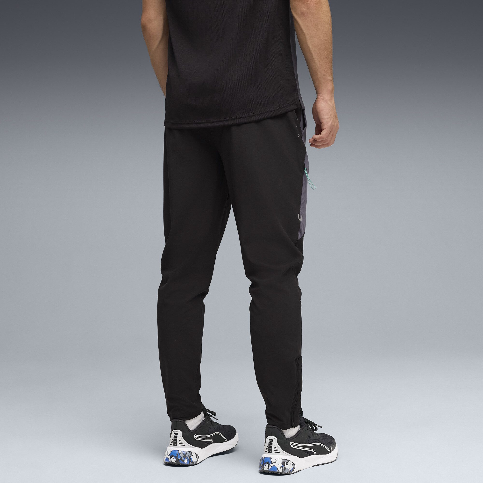 PUMA Trainingshose FLEX STRETCH Gewebte Trainingshose Herren