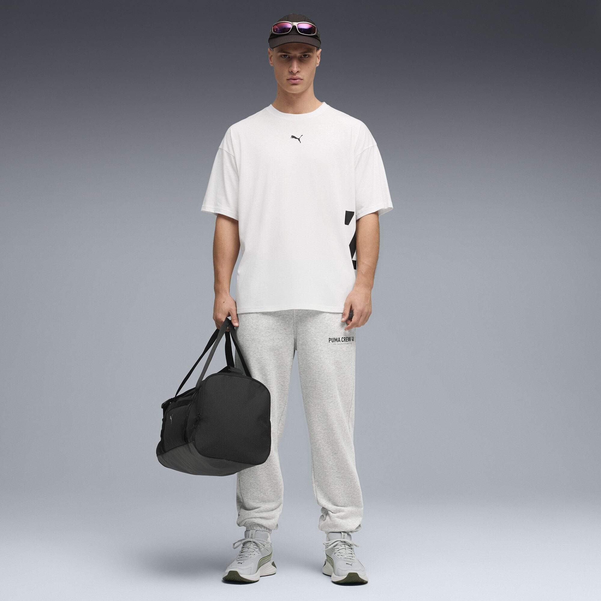 PUMA Trainingshose Graphics Training Jogginghose Herren