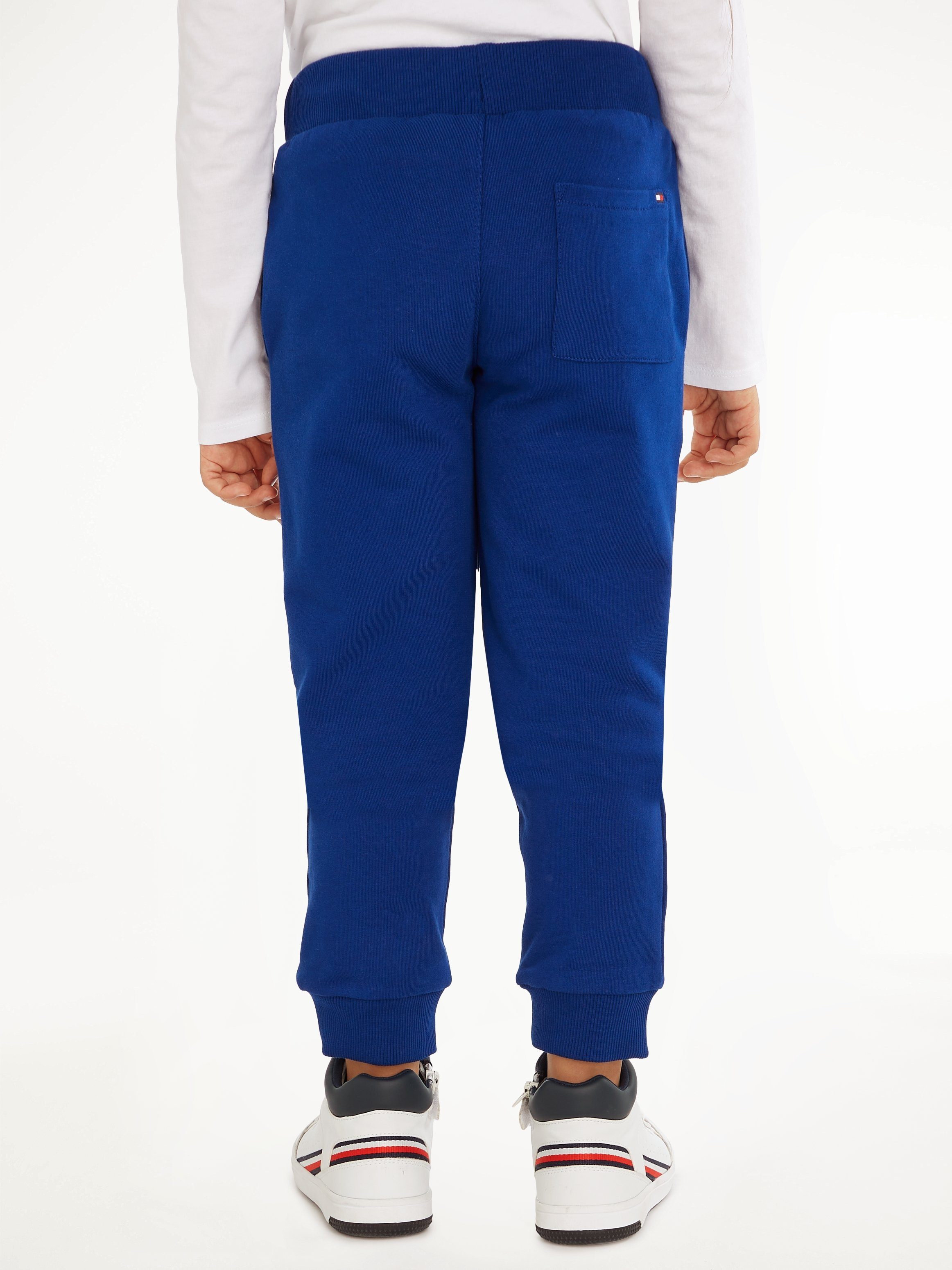 ESSENTIAL Hilfiger Tommy linken U Tommy Sweathose mit SWEATPANTS Bein auf Hilfiger dem Logo-Schriftzug