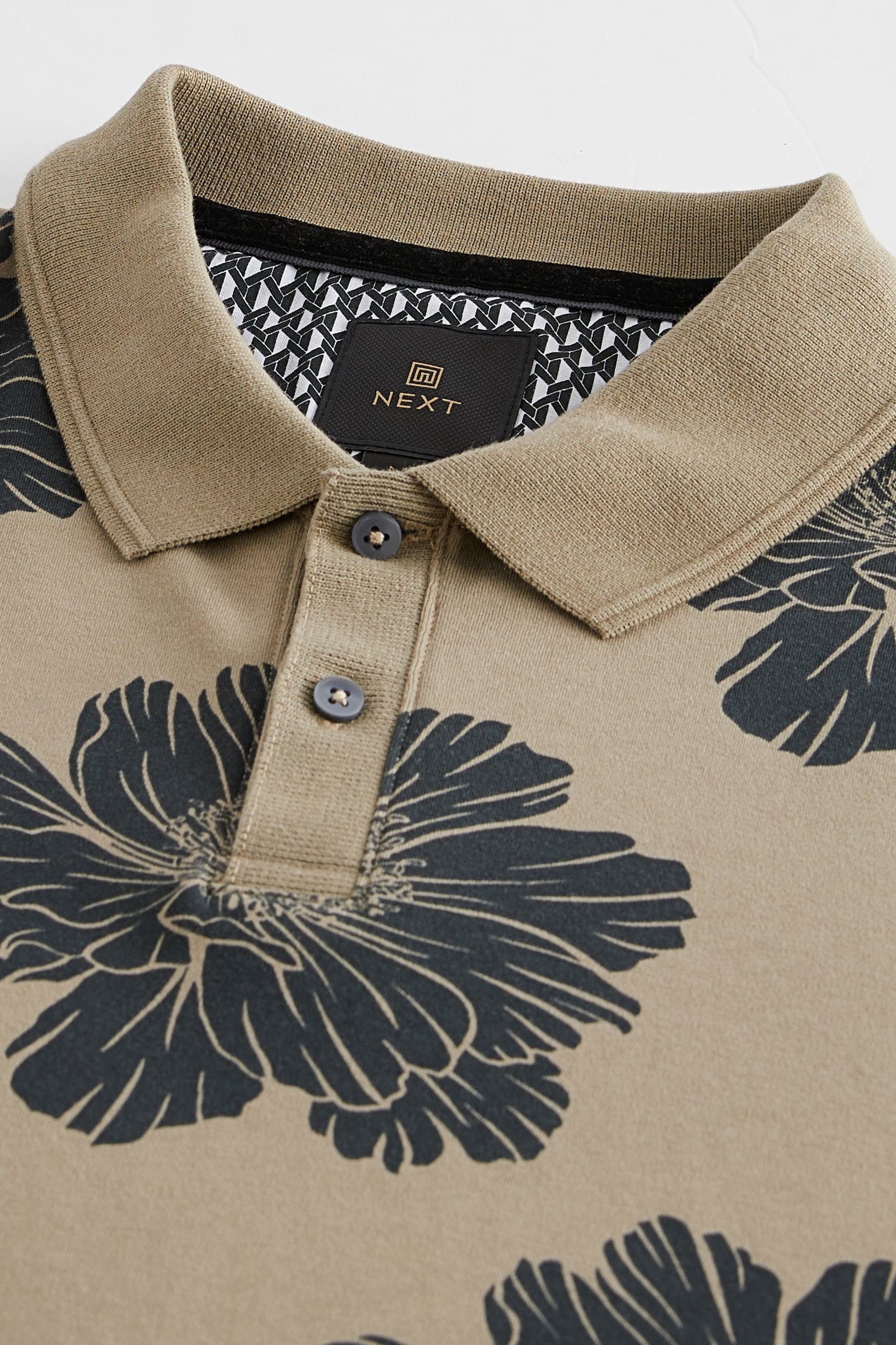 mit Neutral/Black Floral Polo-Shirt Next (1-tlg) Poloshirt Geoprint
