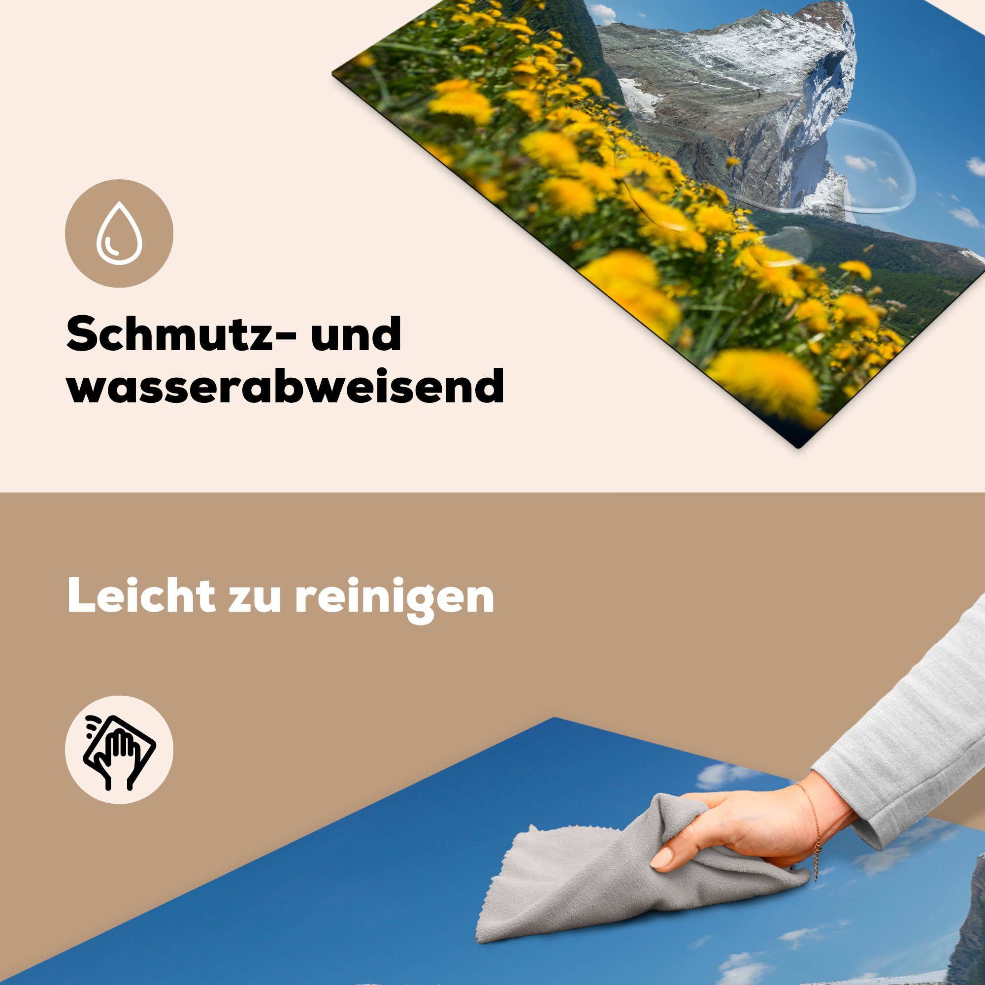 (1 Löwenzahnwiese, nutzbar, 70x52 Das über Matterhorn cm, MuchoWow der Mobile Vinyl, Schweiz tlg), einer Herdblende-/Abdeckplatte Ceranfeldabdeckung Arbeitsfläche in