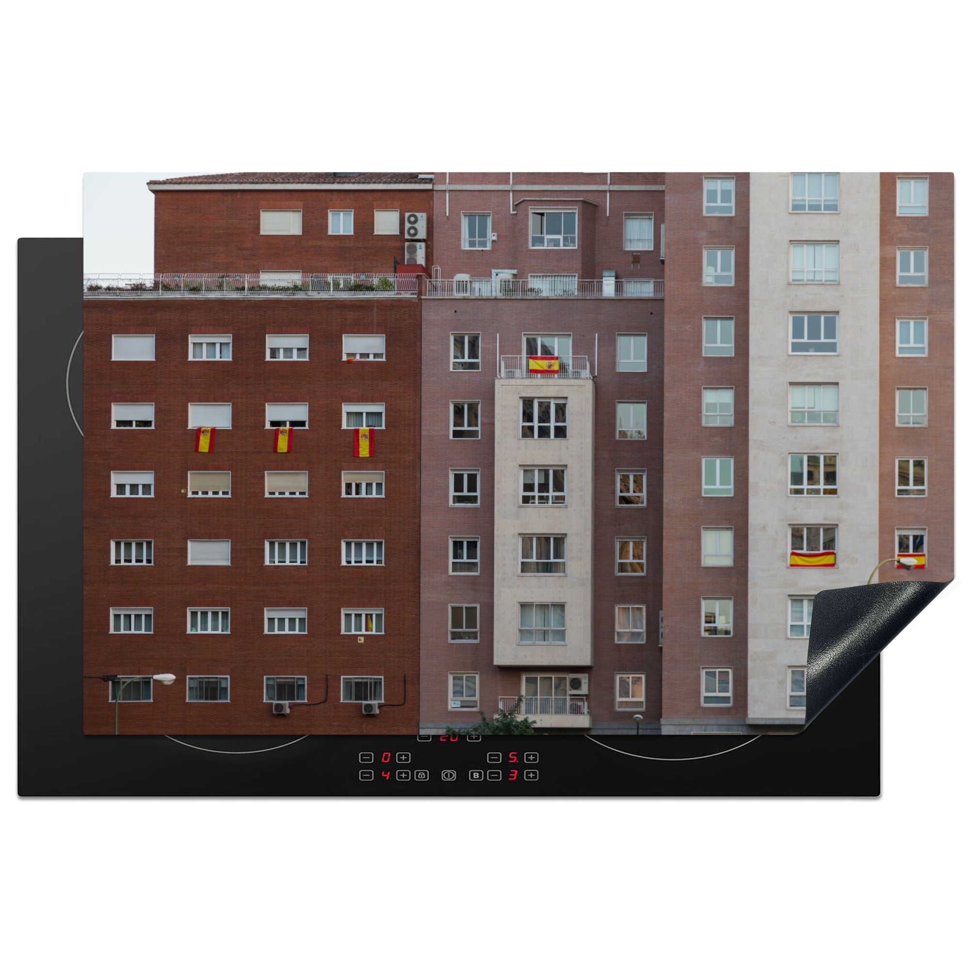 MuchoWow Herdblende-/Abdeckplatte Frontansicht von Häusern in Madrid, Spanien, Vinyl, (1 tlg), 81x52 cm, Induktionskochfeld Schutz für die küche, Ceranfeldabdeckung