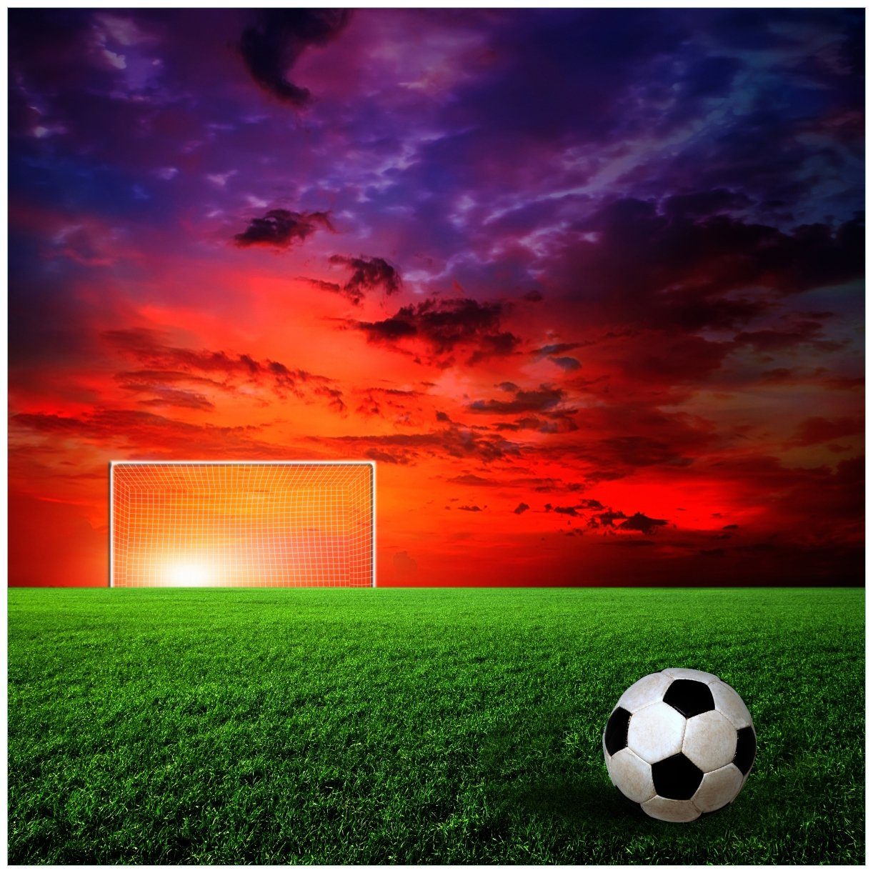 Wallario Glasbild, Fußball - Fußballfeld bei Sonnenuntergang, in verschiedenen Ausführungen