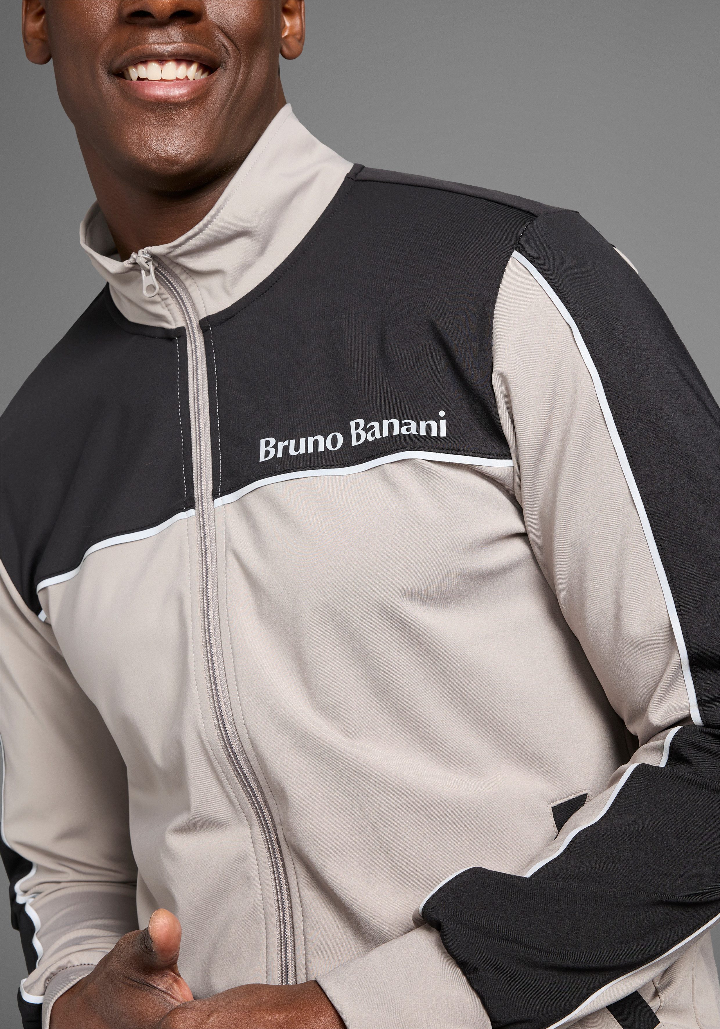 Bruno Banani Sweatjacke mit Reflektorstreifen in Teilungsnähten. Reduzierter Preis € 27,66. Unverbindliche Preisempfehlung € 49,99