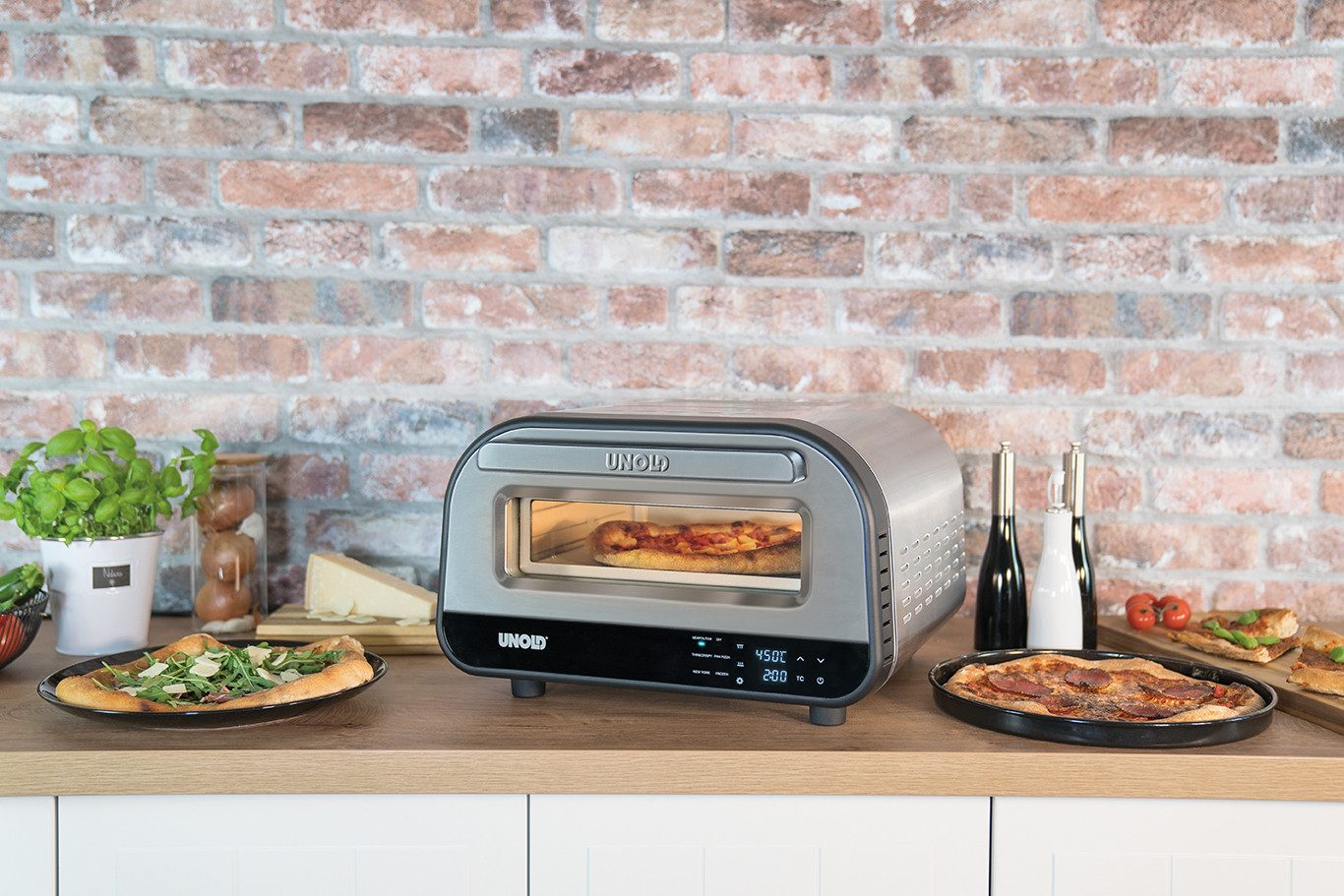 Unold Pizzaofen Bundle Luigi mit Pizzastein & Pizzaschieber Aluminium, Leistungsstarke bis zu 450 °C, Ober- und Unterhitze