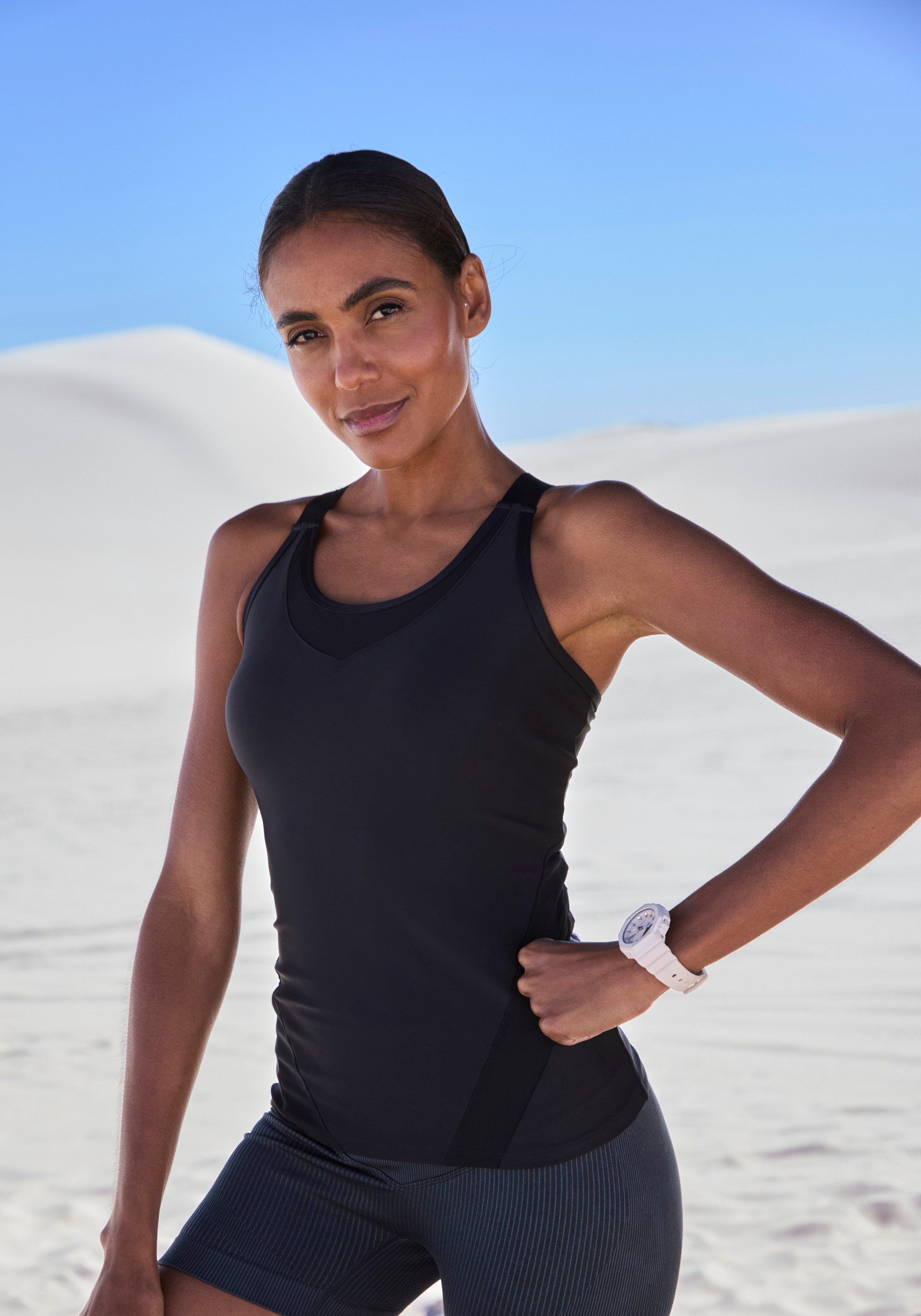 LASCANA ACTIVE Sporttop mit Mesh-Einsatz und gekreuzte Träger im Rücken günstig online kaufen
