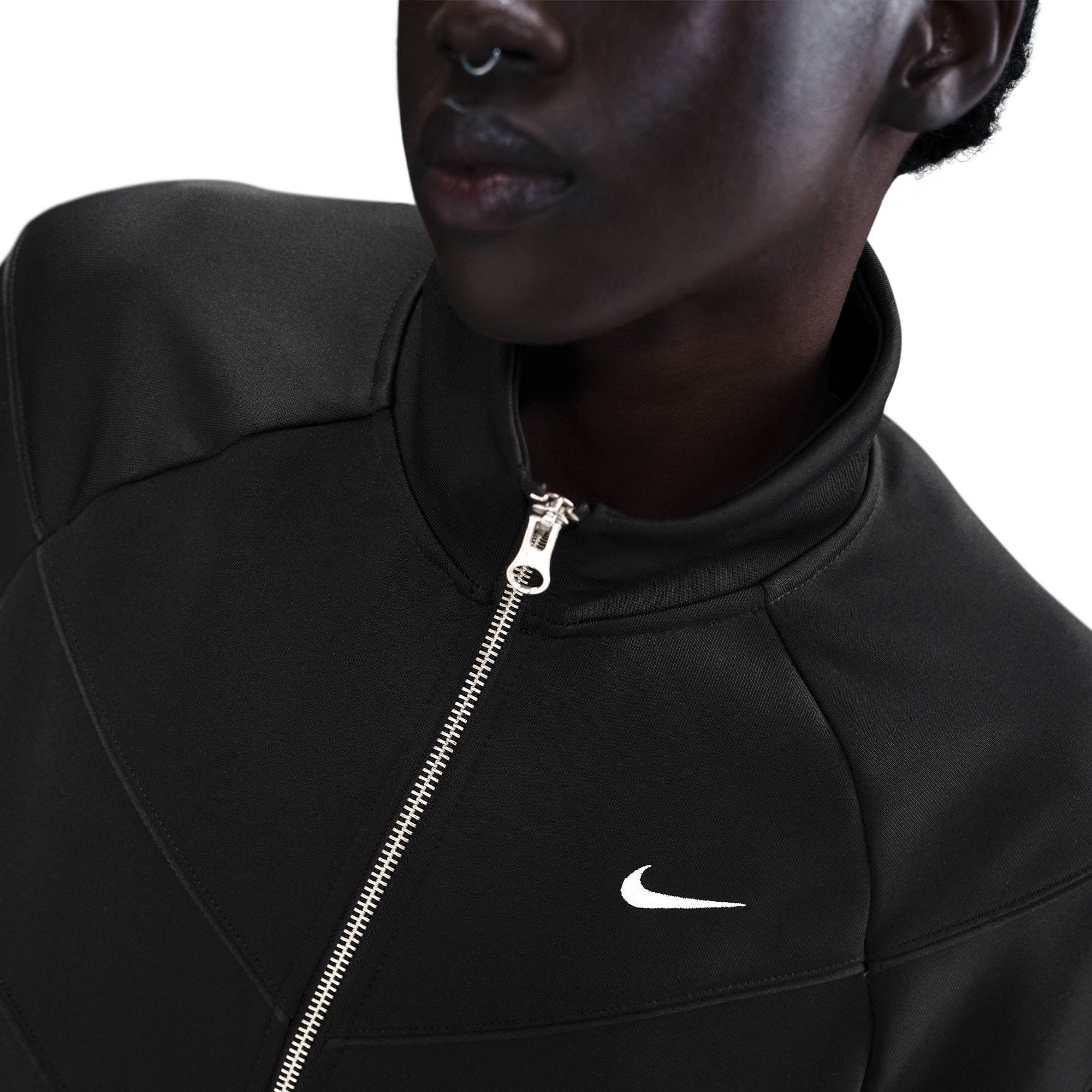 Nike Sportswear Trainingsjacke W NSW NK WR POLY KNIT JKT sportlicher Stil, mit Stehkragen, wasserabweisend, windabweisend