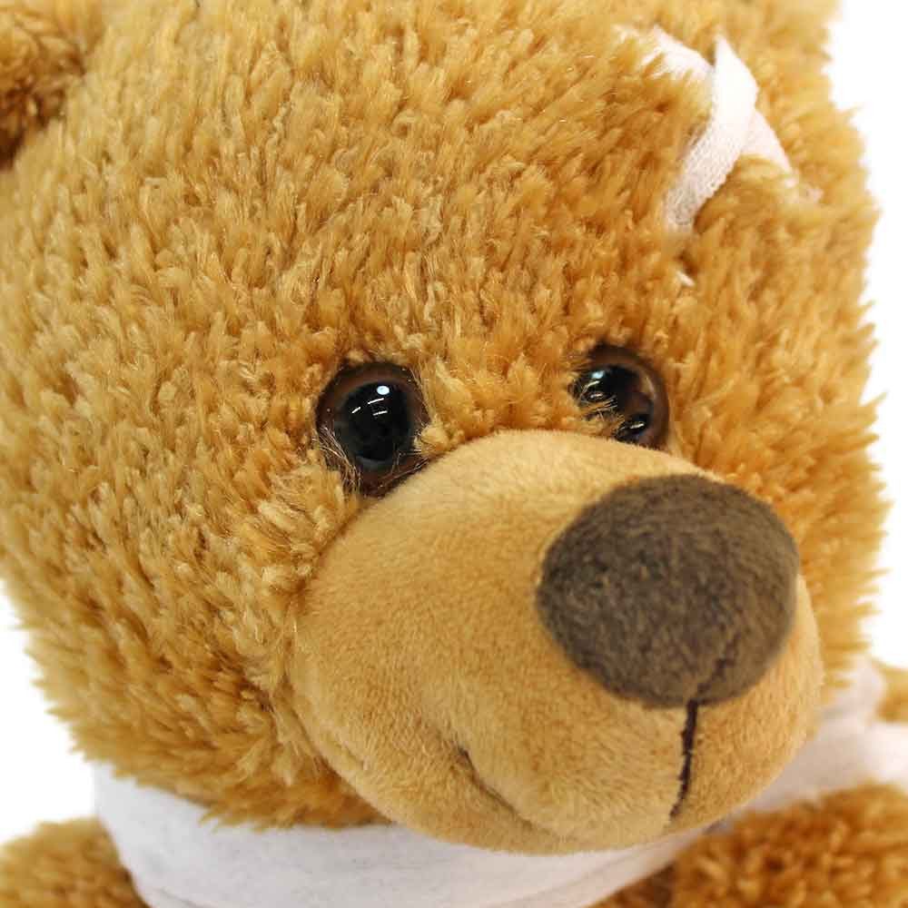 Euro Souvenirs Kuscheltier Unfall Teddy mit Verband "Jan" - ca. 22 cm (1-St)