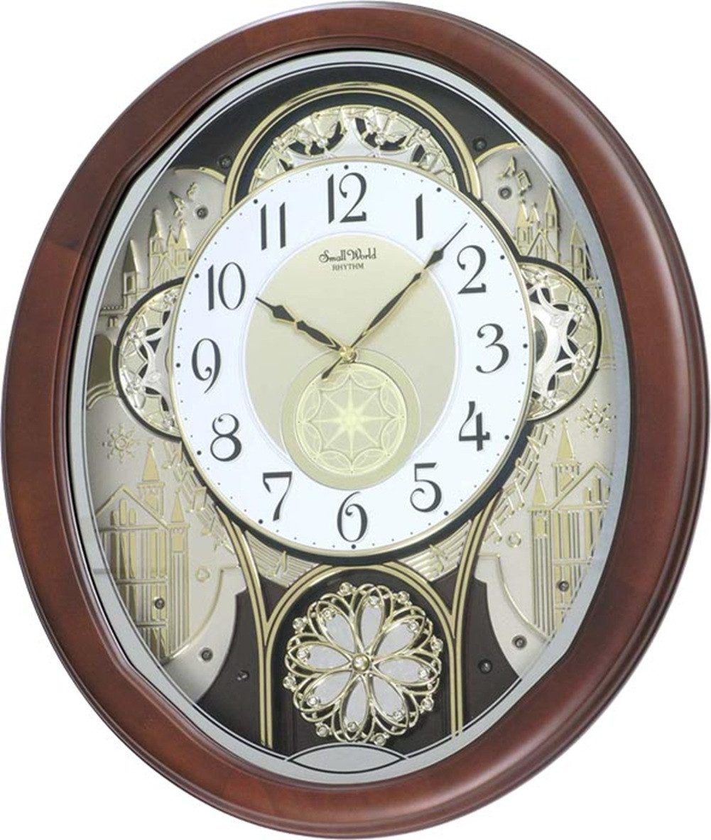 Rhythm Wanduhr MAGIC MOTION CLOCK Rhythm 7447 bewegliches Zifferblatt (30 Melodien, Lautstärkenregler, Nachtsensor)