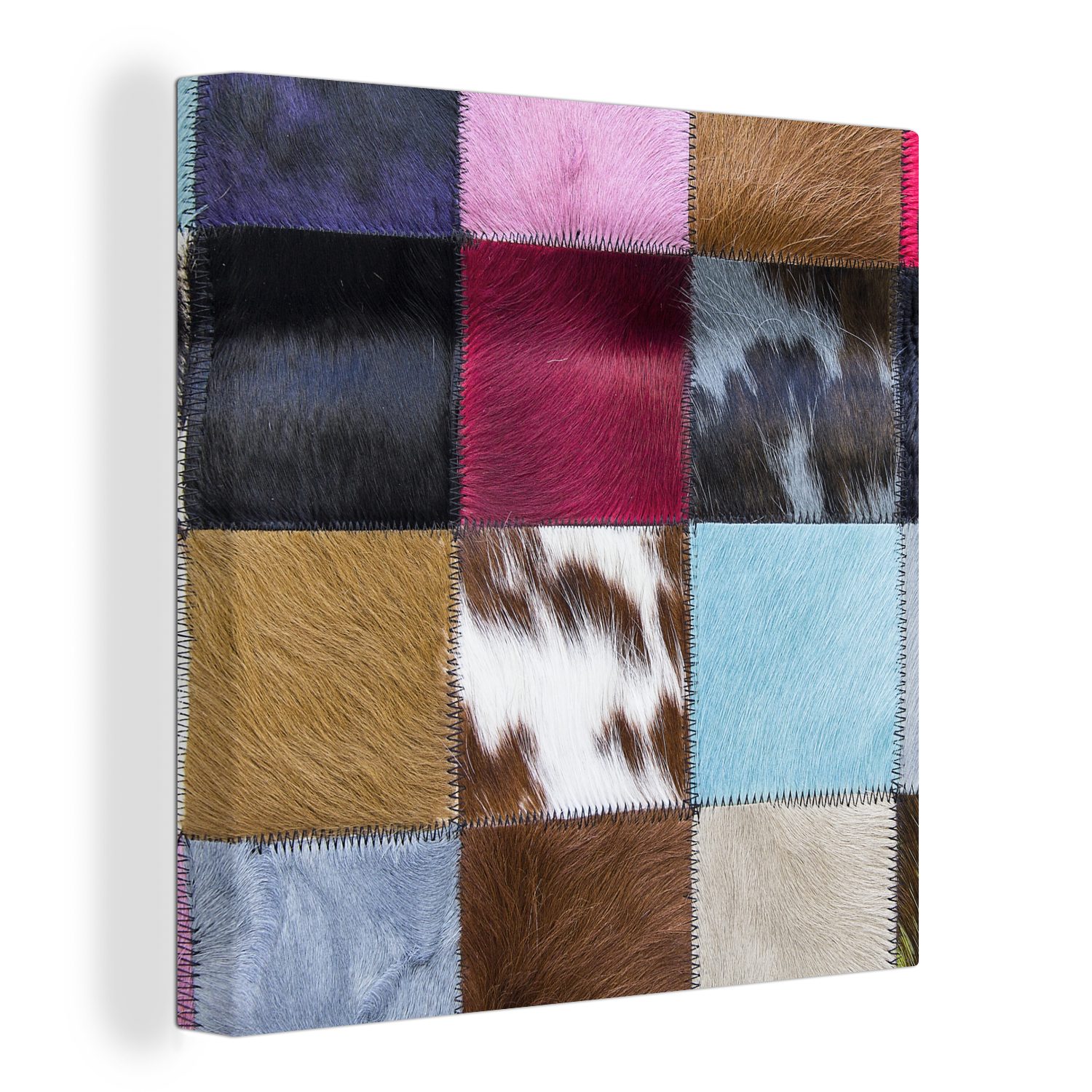 OneMillionCanvasses® Leinwandbild Ein farbenfroher Karoteppich mit unter anderem Kuhfell, (1 St), Leinwand Bilder für Wohnzimmer Schlafzimmer