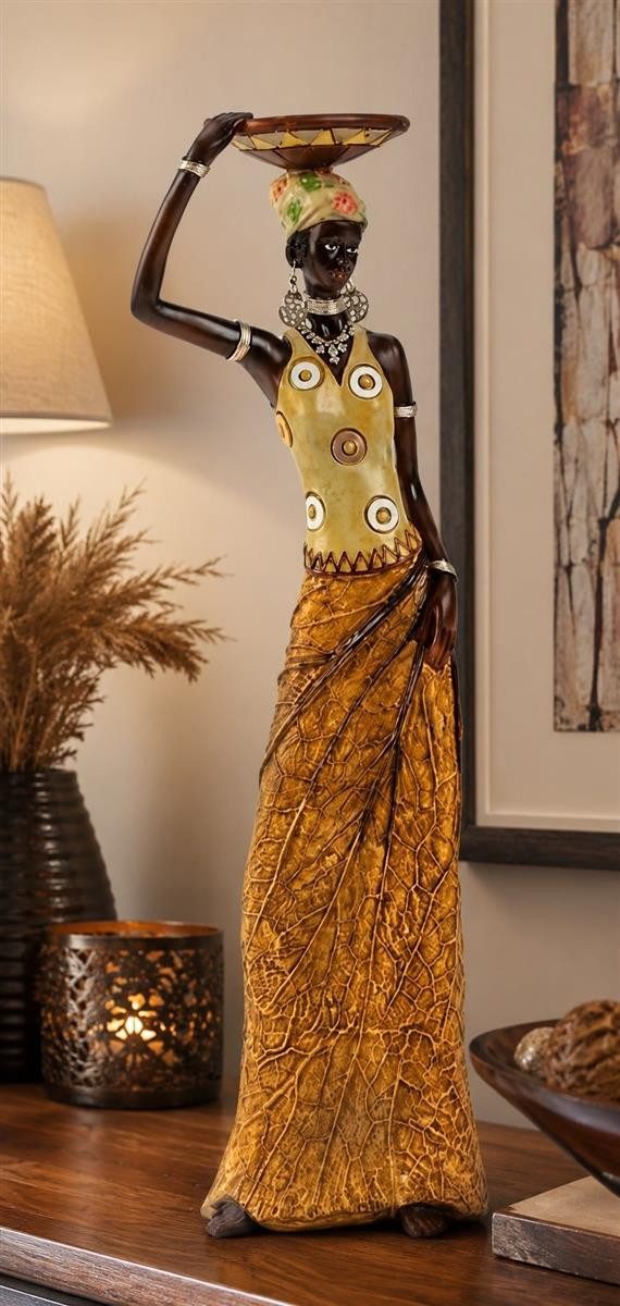 Geschenkestadl Afrikafigur Afrikanische Frau mit Schale, Rock in Blattoptik 35–40 cm Dekofigur (1tlg), Der Rock ist in Blattform gearbeitet – Bild 2 von 3