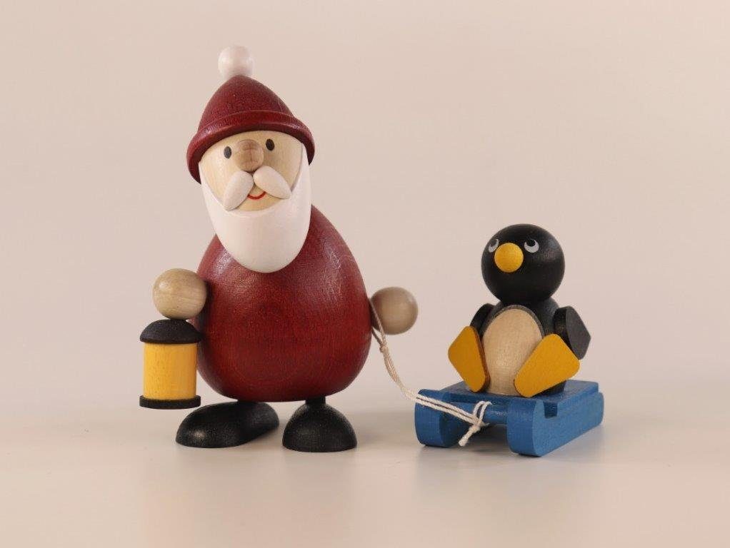 Ullrich Kunsthandwerk Weihnachtsfigur 9,5cm Weihnachtsfigur mit Höhe und N Pinguin Schlitten Weihnachtsmann