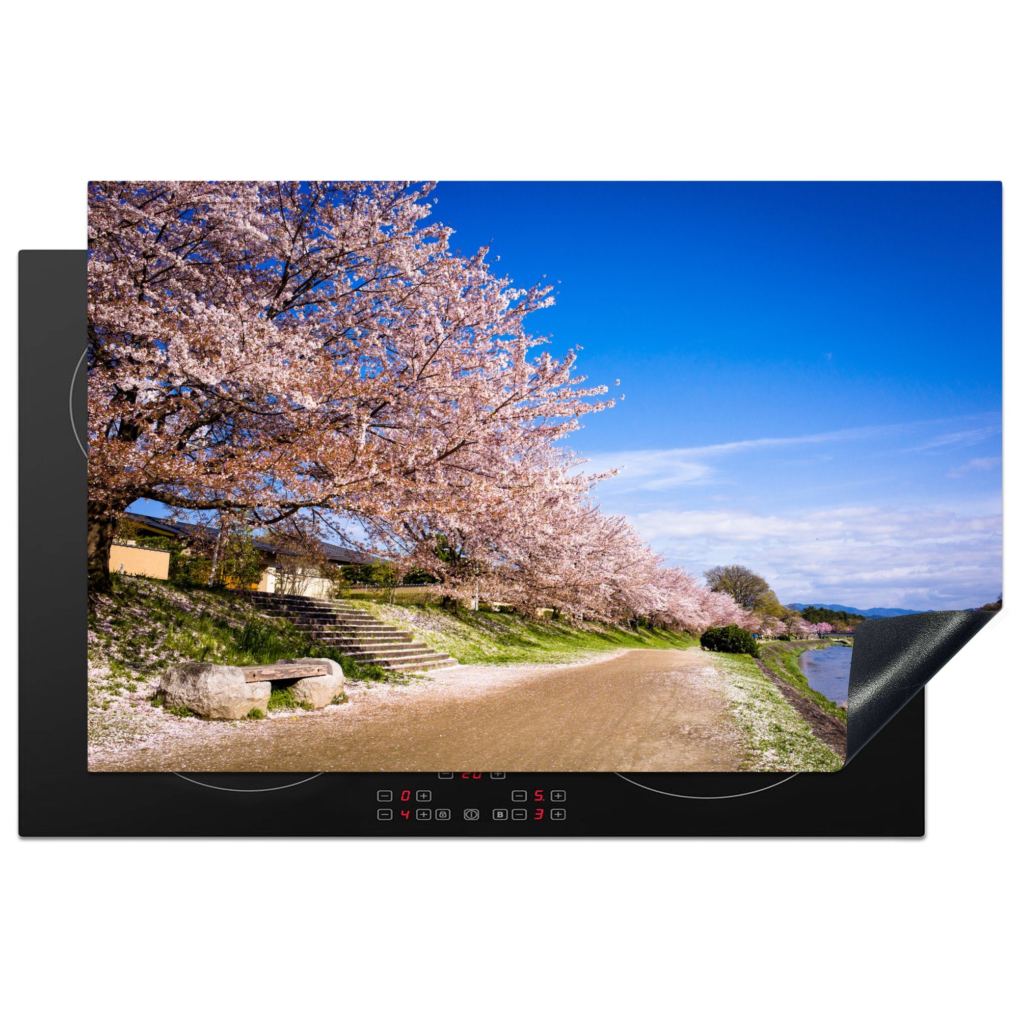 MuchoWow Herdblende-/Abdeckplatte Blühende Kirschblüte in Kyoto, Japan, vor blauem Himmel, Vinyl, (1 tlg), 81x52 cm, Induktionskochfeld Schutz für die küche, Ceranfeldabdeckung