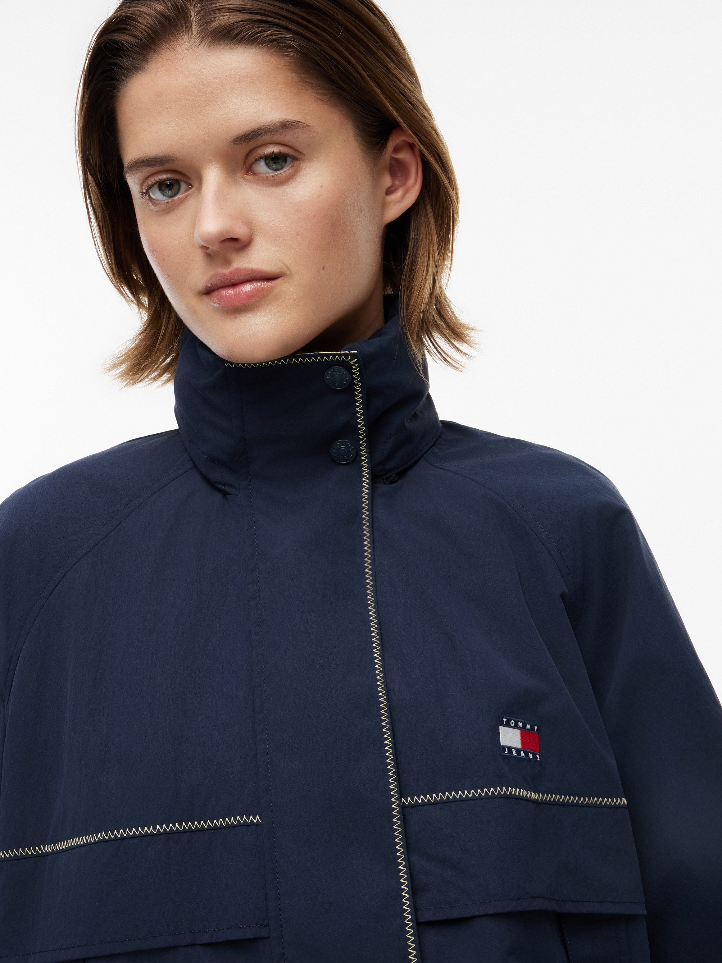 Tommy Jeans Windbreaker TJW COLORBLOCK WINDBREAKER Kunstfaser, elastische Bündchen, verdeckter Reißverschluss