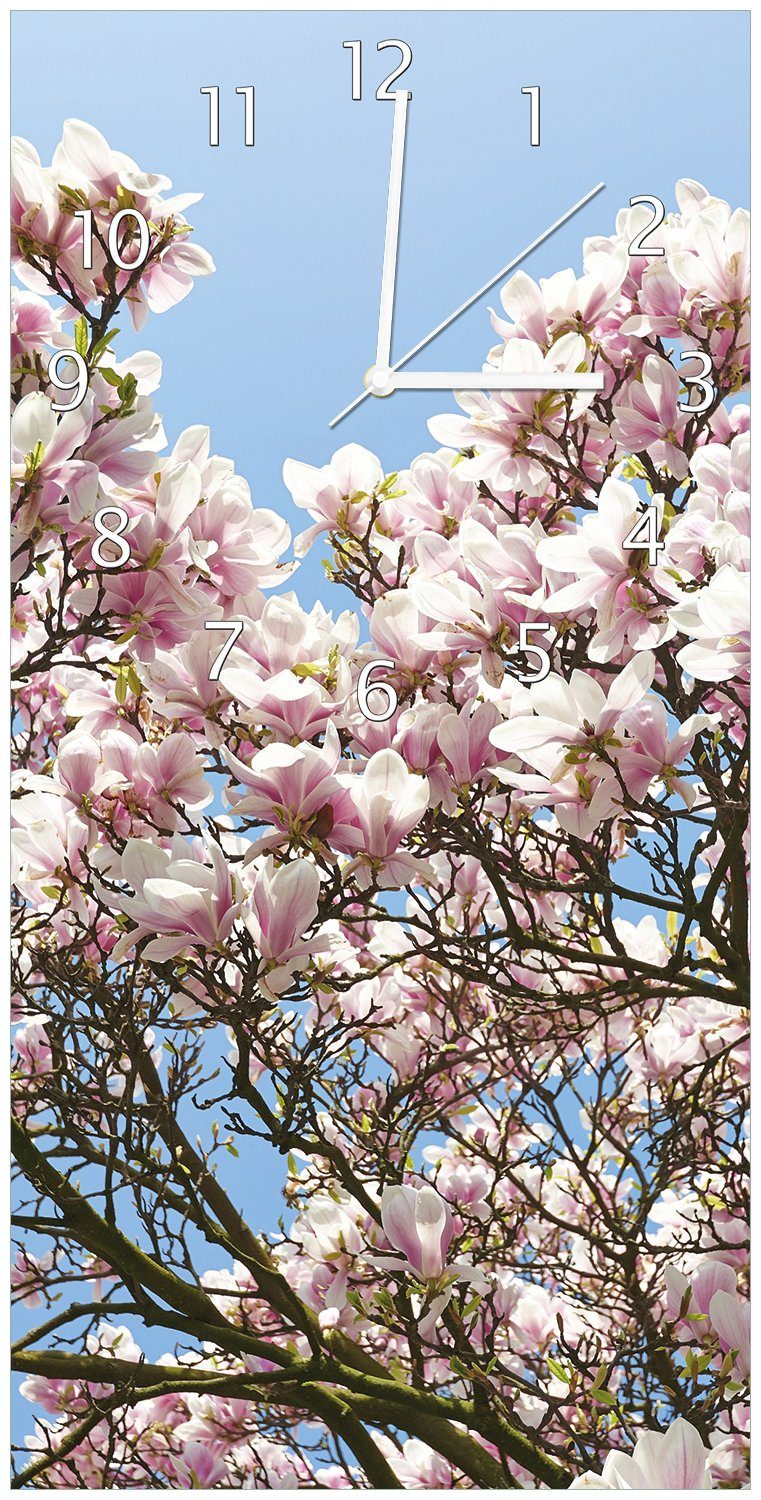 Wallario Wanduhr Schöne rosa Magnolien-Blüten vor blauem Himmel (Uhr aus Acryl)