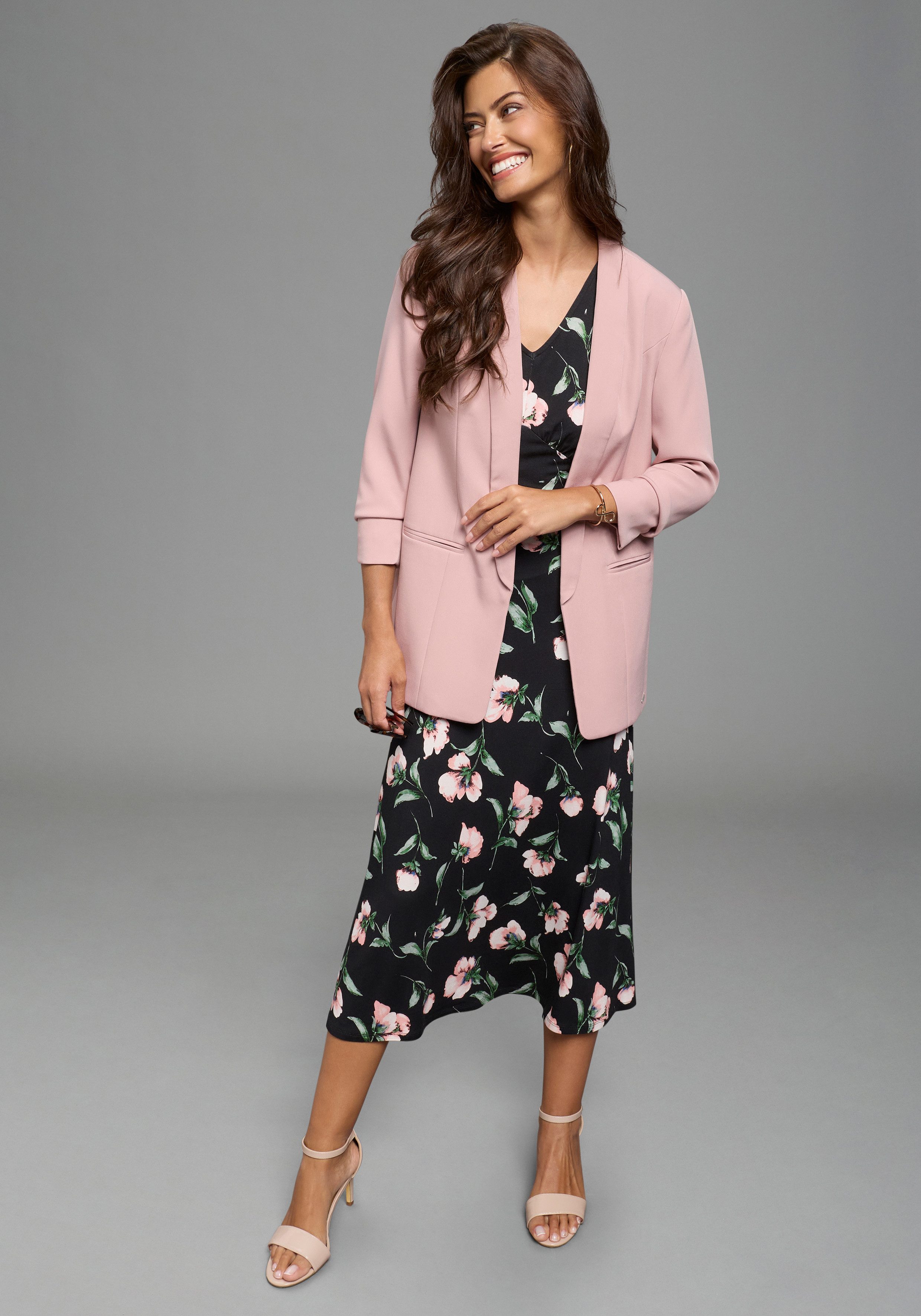 Laura Scott Midikleid mit tiefem Rückenausschnitt und Knotendetail, geblümt. € 54,99, (€ 54,99 pro 1 Stk).