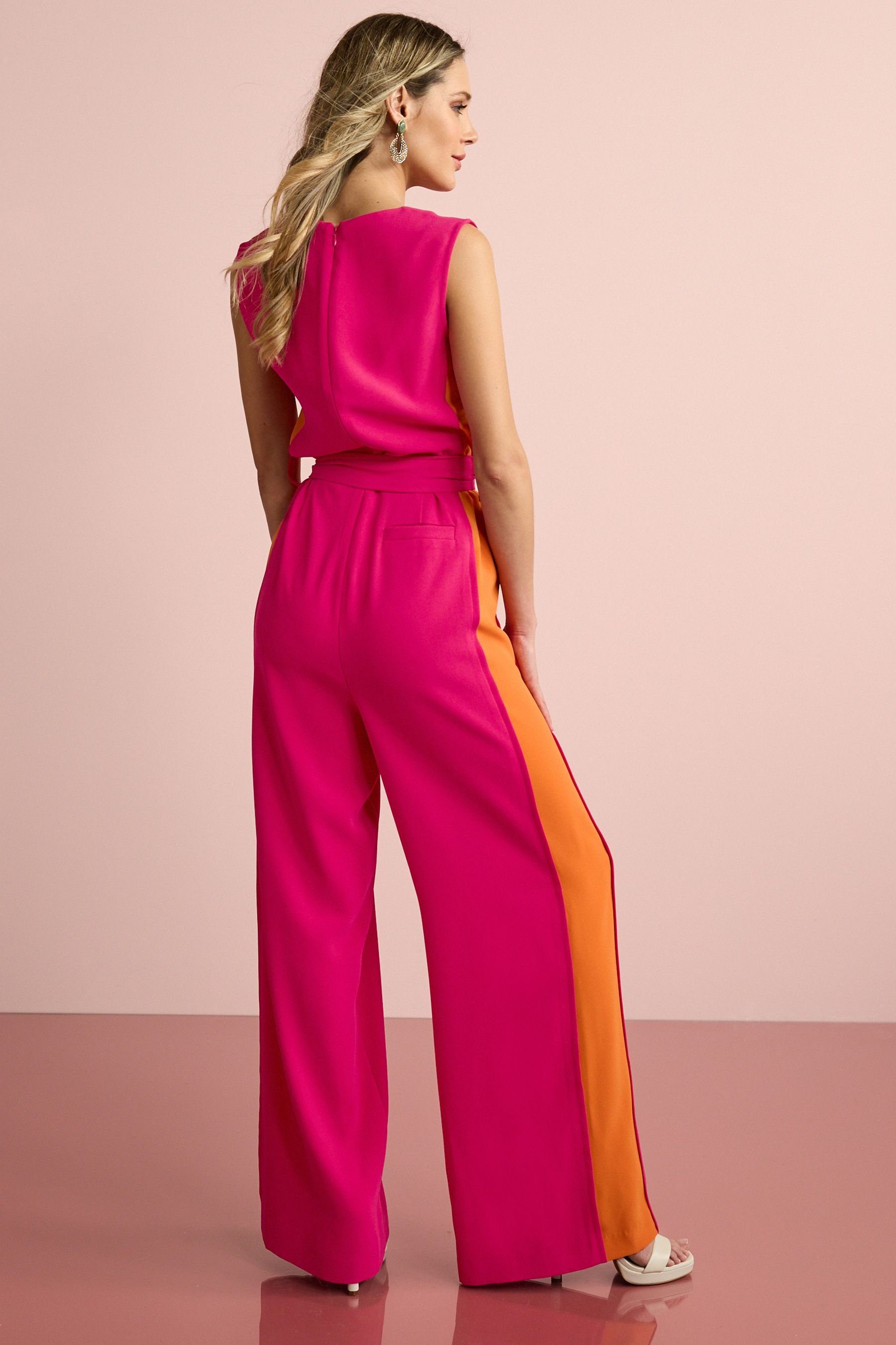 Einsatz Gürtel mit und Pink/Orange Jumpsuit (1-tlg) Jumpsuit Next
