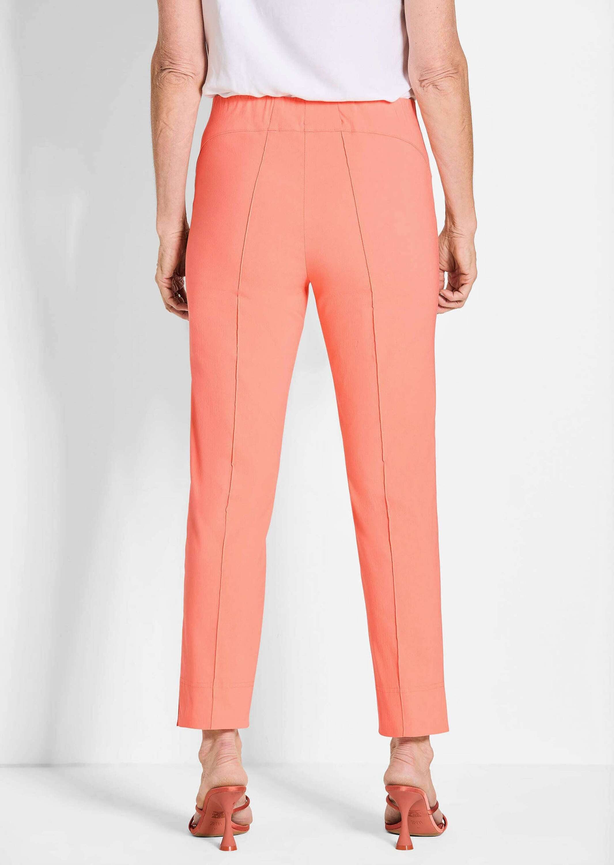 GOLDNER Schlupfhose Kurzgröße: Orange Hose LOUISA mit Biesen Elastische, lange Slim Fit Hose, mit Schlupfbund
