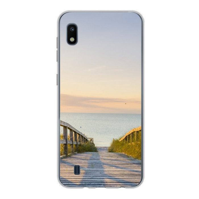 MuchoWow Handyhülle Ruhiger Strand in Deutschland bei Sonnenuntergang Handyhülle Samsung Galaxy A10 Smartphone-Bumper Print Handy