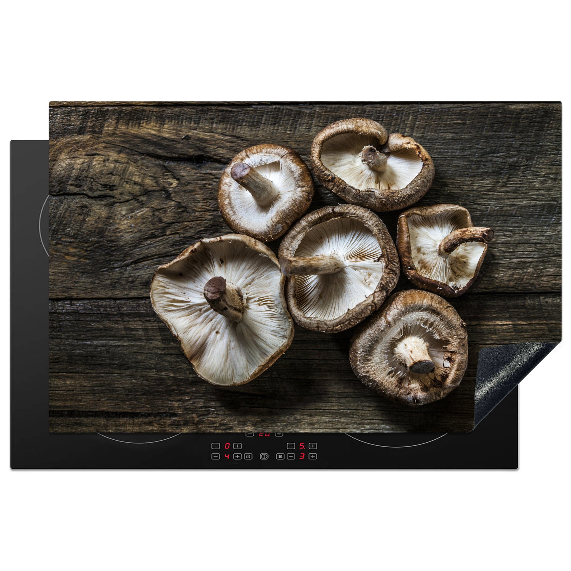 MuchoWow Herdblende-/Abdeckplatte Pilze auf einem hölzernen Hintergrund, Vinyl, (1 tlg), 81x52 cm, Induktionskochfeld Schutz für die küche, Ceranfeldabdeckung