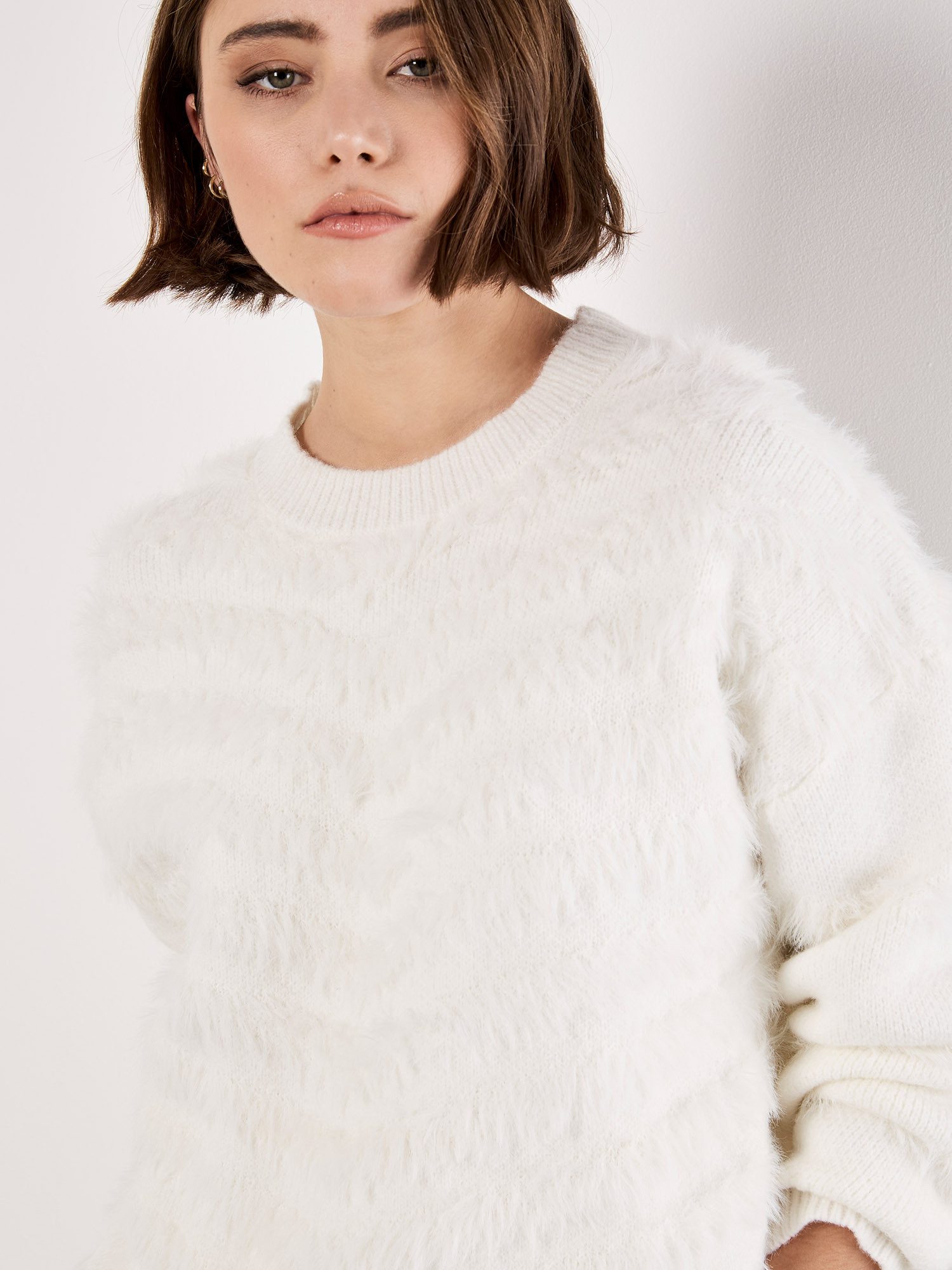 Apricot Rundhalspullover Flauschiger Pullover mit Wellendesign