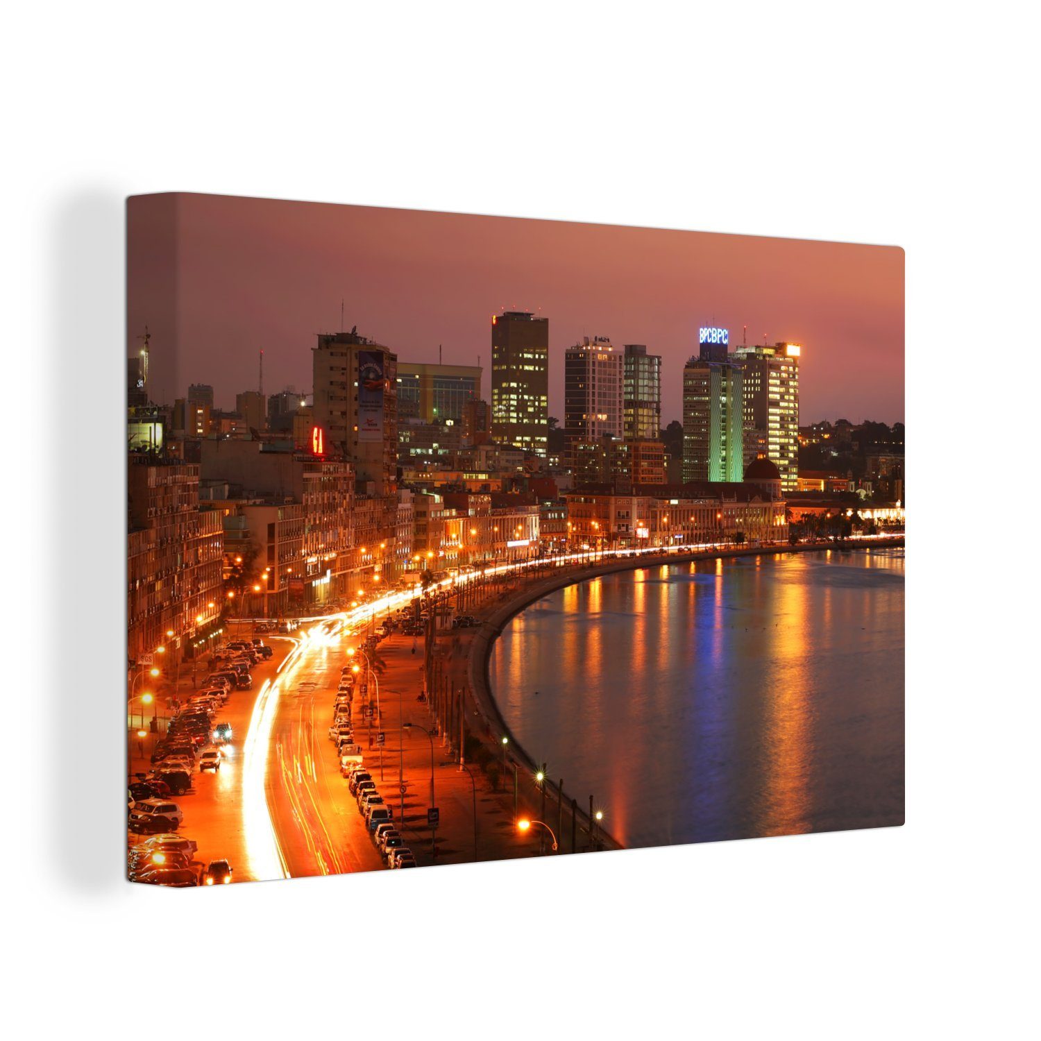 OneMillionCanvasses® Leinwandbild Die Bucht von Luanda leuchtet in der Abenddämmerung in Afrika, (1 St), Wandbild Leinwandbilder, Aufhängefertig, Wanddeko, 30x20 cm