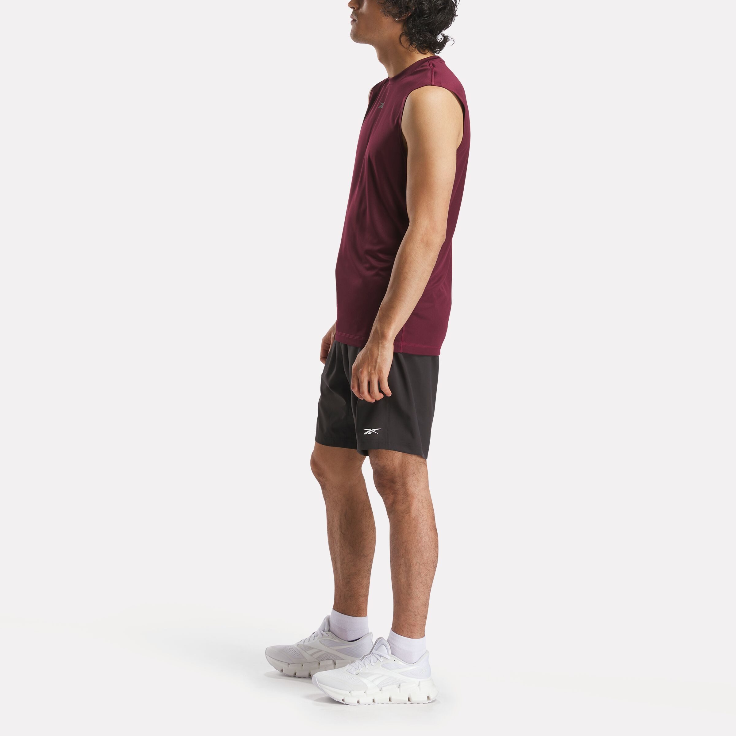 Reebok Trainingsshorts WOR WOVEN SHORT kurze Trainingsshorts, ca. Mitte Oberschenkel geschnitten