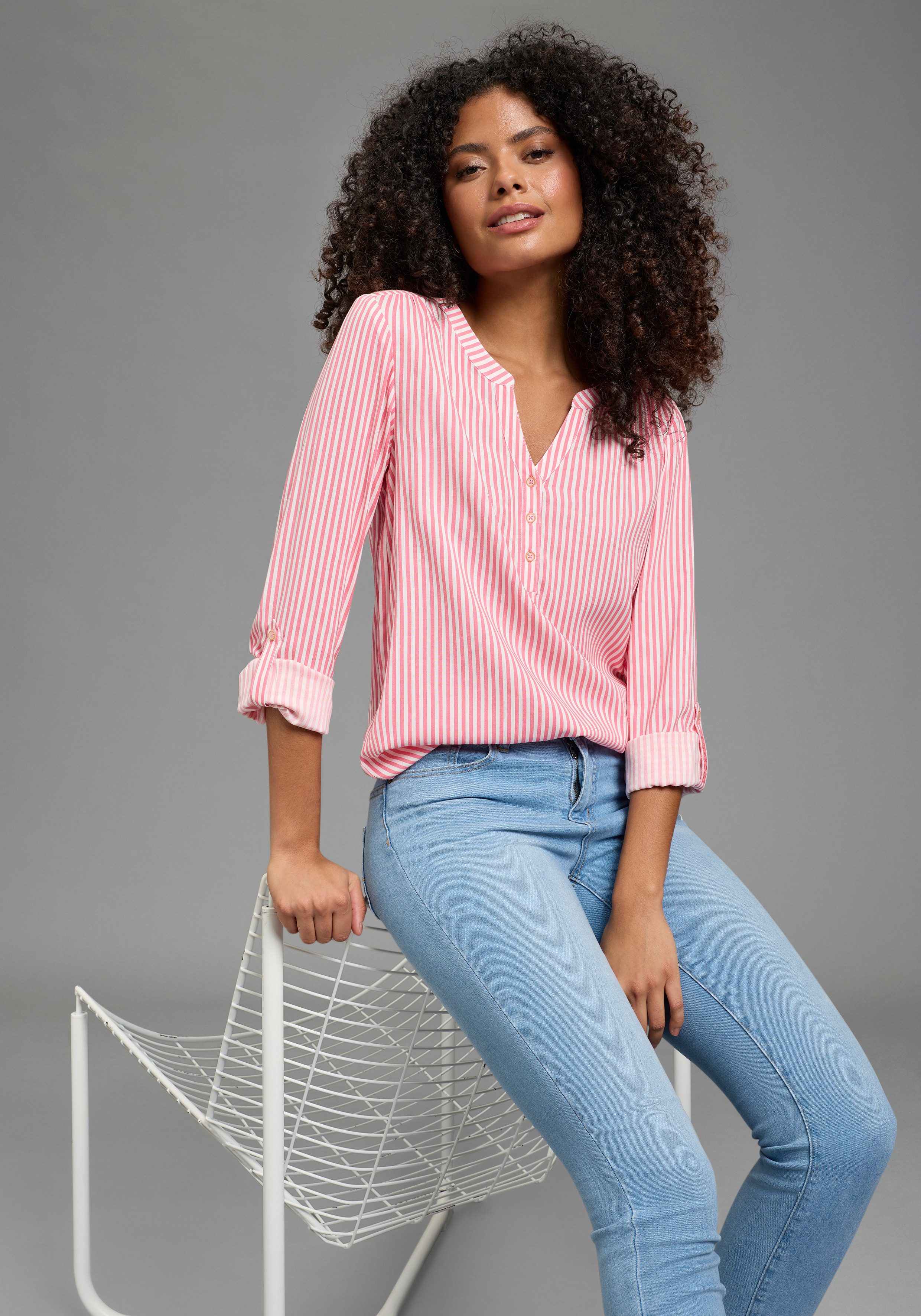 KangaROOS Schlupfbluse Langarmbluse, figurumspielende Passform, Rundhalsaus günstig online kaufen