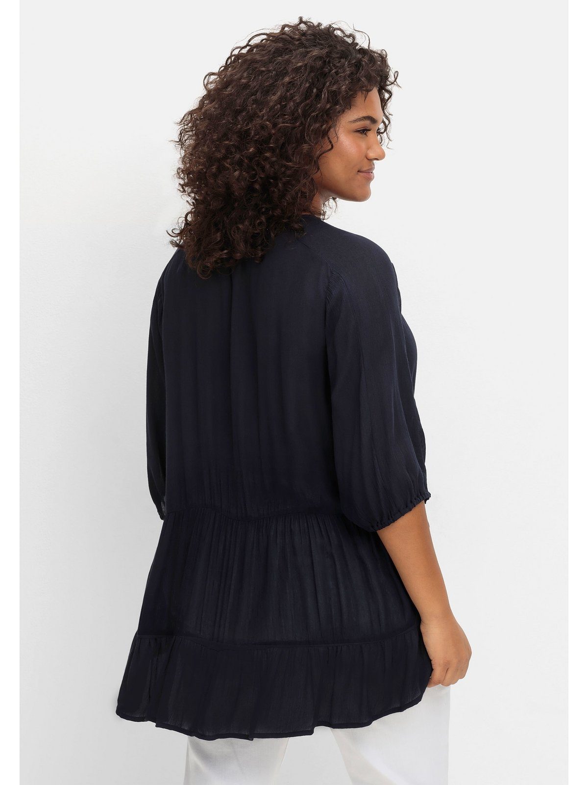 Sheego Kurzarmbluse Große Größen aus Crêpe, mit Volants am Saum