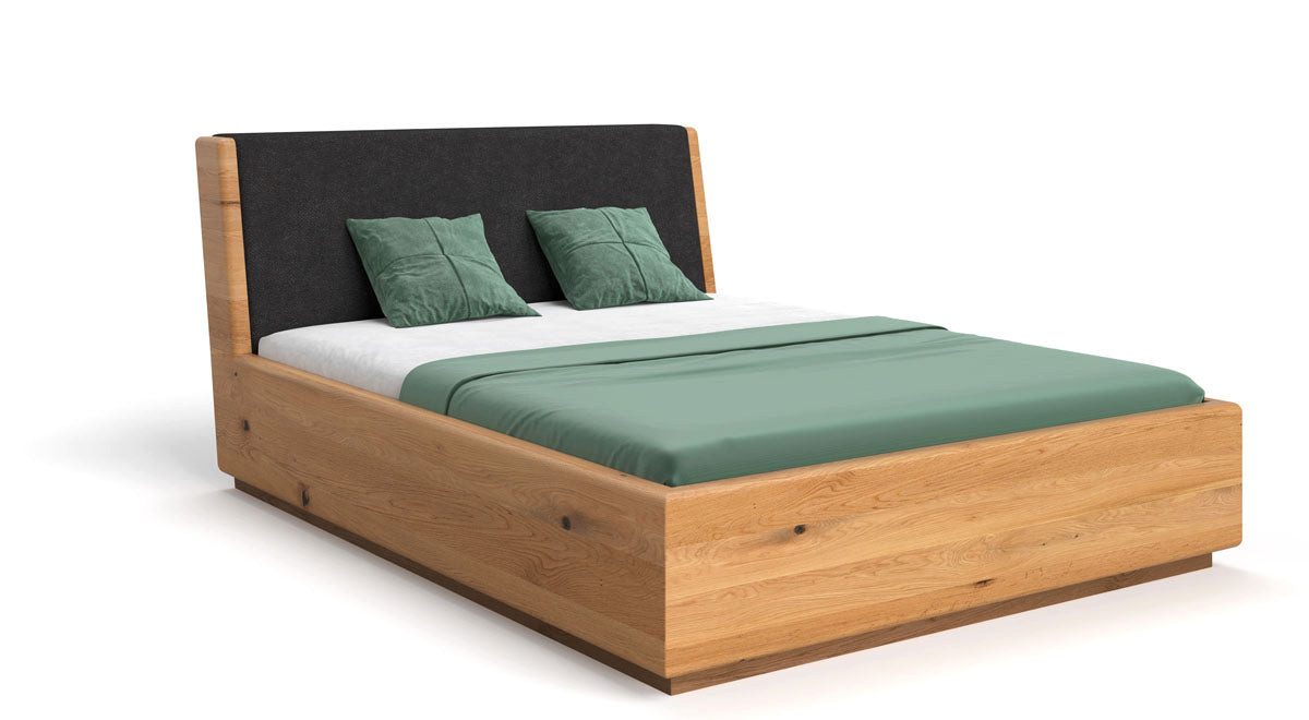 Luxusbetten24 Holzbett Designer Holzbett Cassian, aus massiver Eiche mit Stauraum