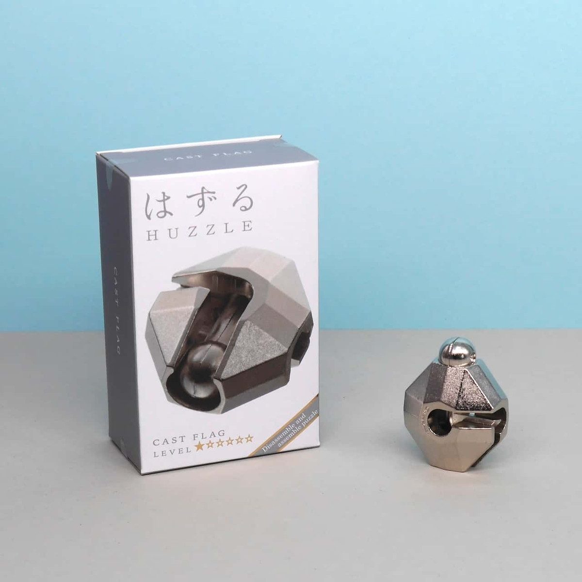 Hanayama Spiel HUZZLE CAST FLAG - tolles Knobelpuzzle, Knobelspiel, Metallpuzzle