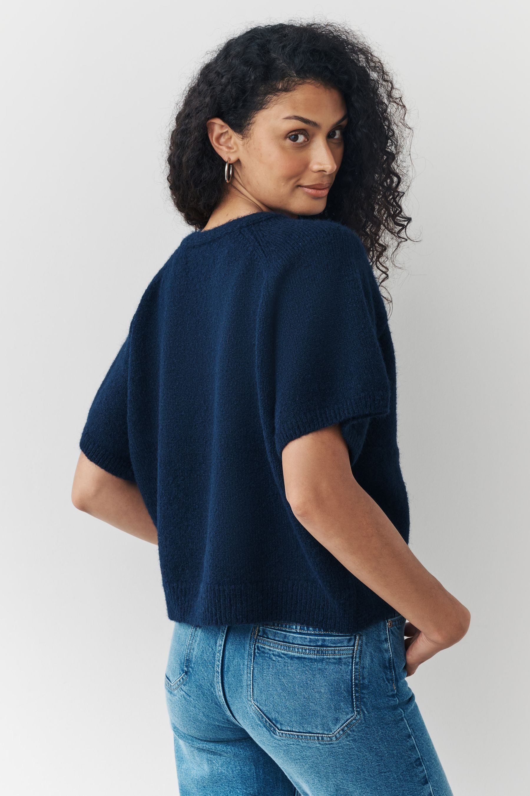 Next Strickponcho Strickponcho mit Twist-Detail am Rücken (1-tlg) günstig online kaufen