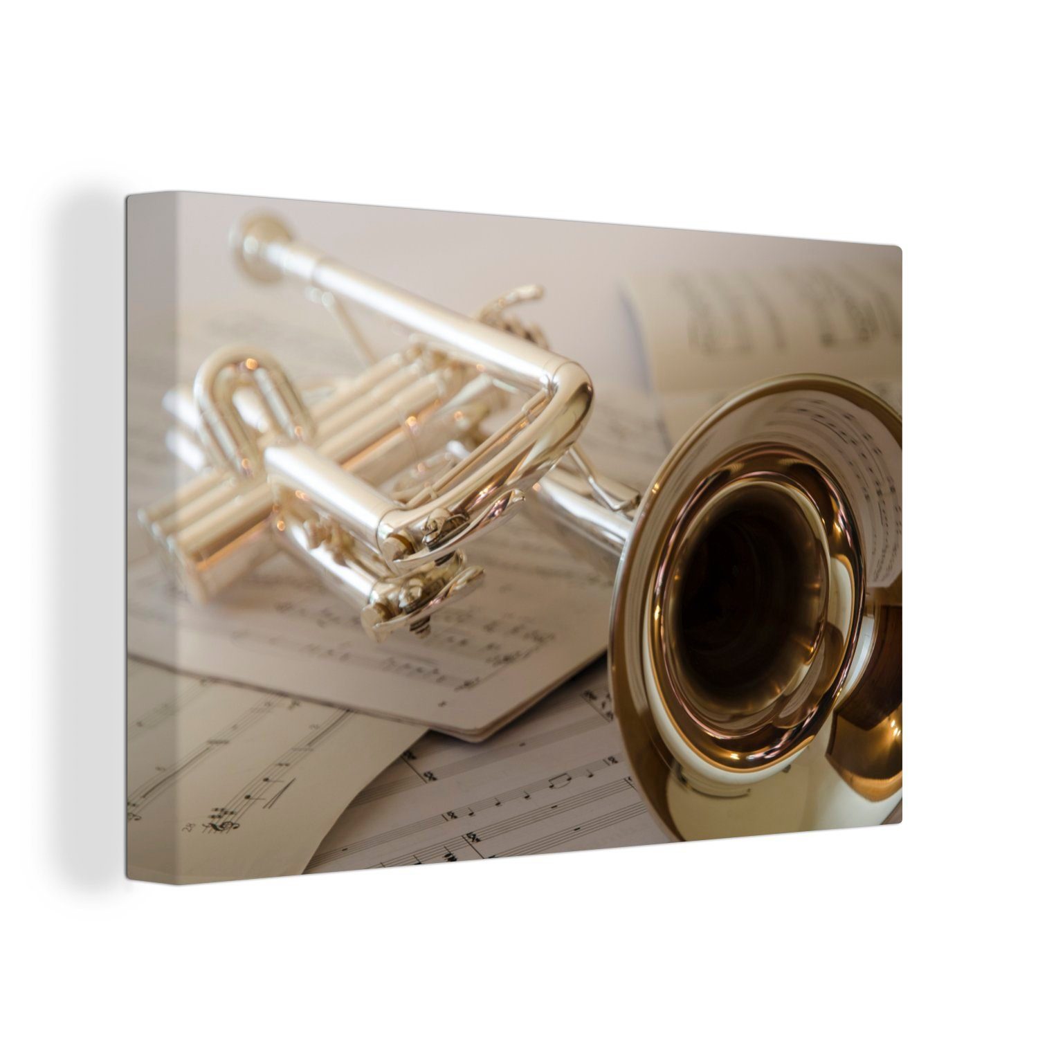 OneMillionCanvasses® Leinwandbild Trompete auf Notenpapier, (1 St), Wandbild Leinwandbilder, Aufhängefertig, Wanddeko, 30x20 cm | Leinwandbilder