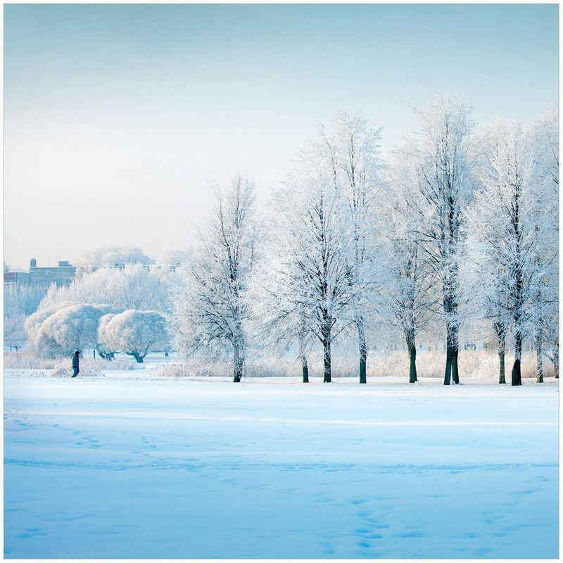 Wallario Acrylglasbild, Verschneite Bäume in einer Winterlandschaft, in verschiedenen Ausführungen