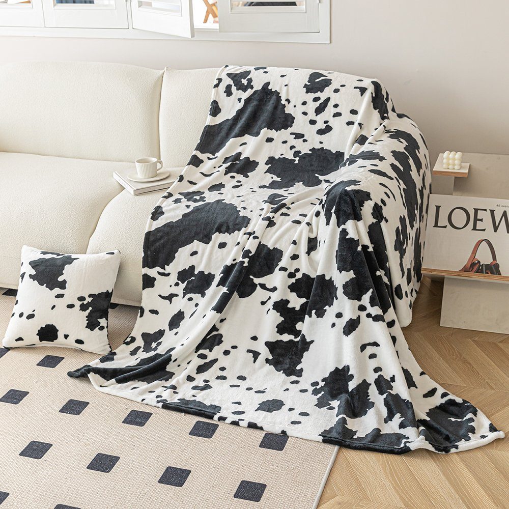 Wolldecke Kuh Muster / Kuscheldecke / günstig online kaufen