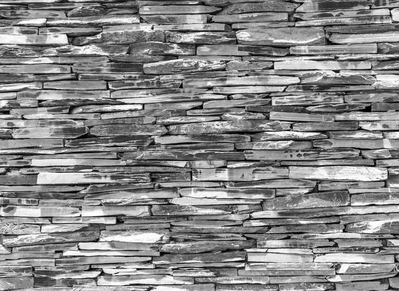 Papermoon Fototapete Steinwand Schwarz & Weiß