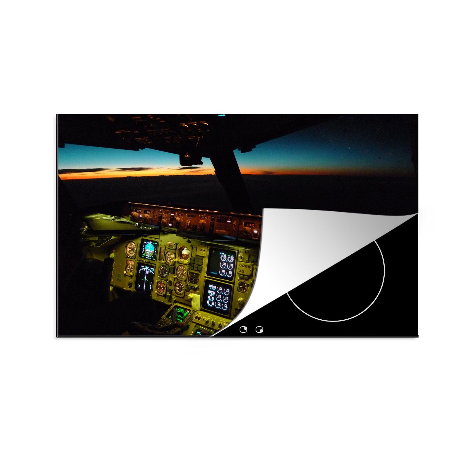 MuchoWow Herdblende-/Abdeckplatte Ein beleuchtetes Cockpit bei Sonnenuntergang, Vinyl, (1 tlg), 83x51 cm, Ceranfeldabdeckung, Arbeitsplatte für küche