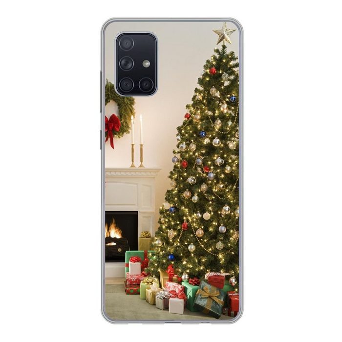 MuchoWow Handyhülle Ein Weihnachtsbaum mit Geschenken neben einem Kamin Handyhülle Samsung Galaxy A51 5G Smartphone-Bumper Print Handy