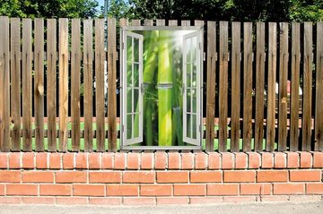 Wallario Sichtschutzzaunmatten Bambus im Sonnenschein, mit Fenster-Illusion