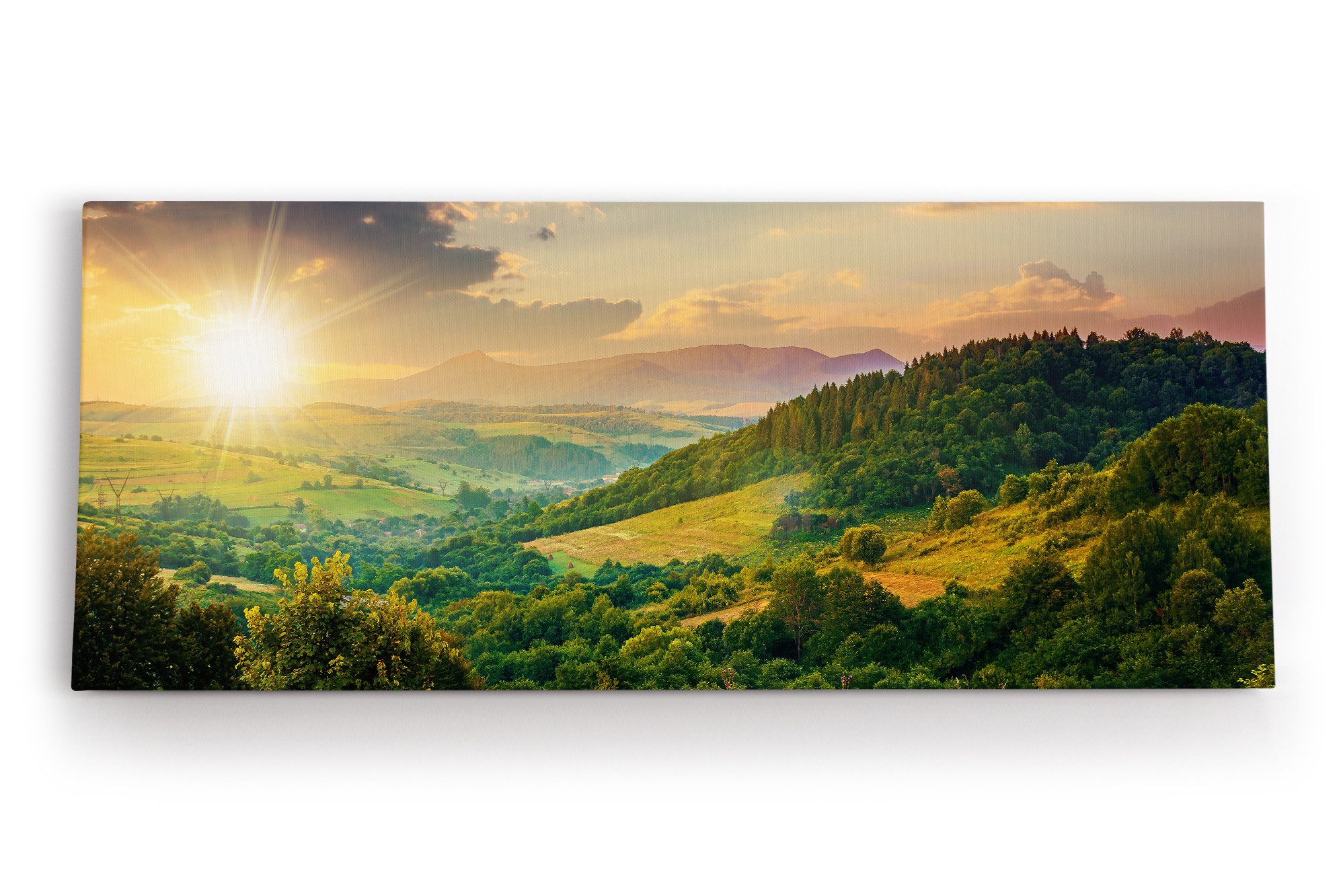 Leinwandbild Hügellandschaft Sonnenuntergang Berge Grün Wiesen